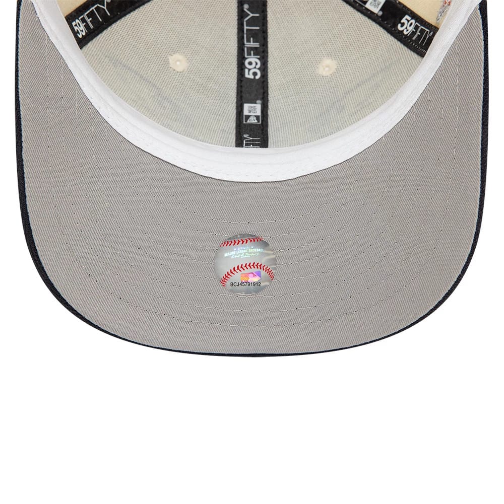 Detroit Tigers MLB Team Wings Light Beige New Era 59FIFTY Fitted Cap, inside view showing the grey undervisor with a baseball sticker, white sweatband, and black taping with 59FIFTY branding in white text.