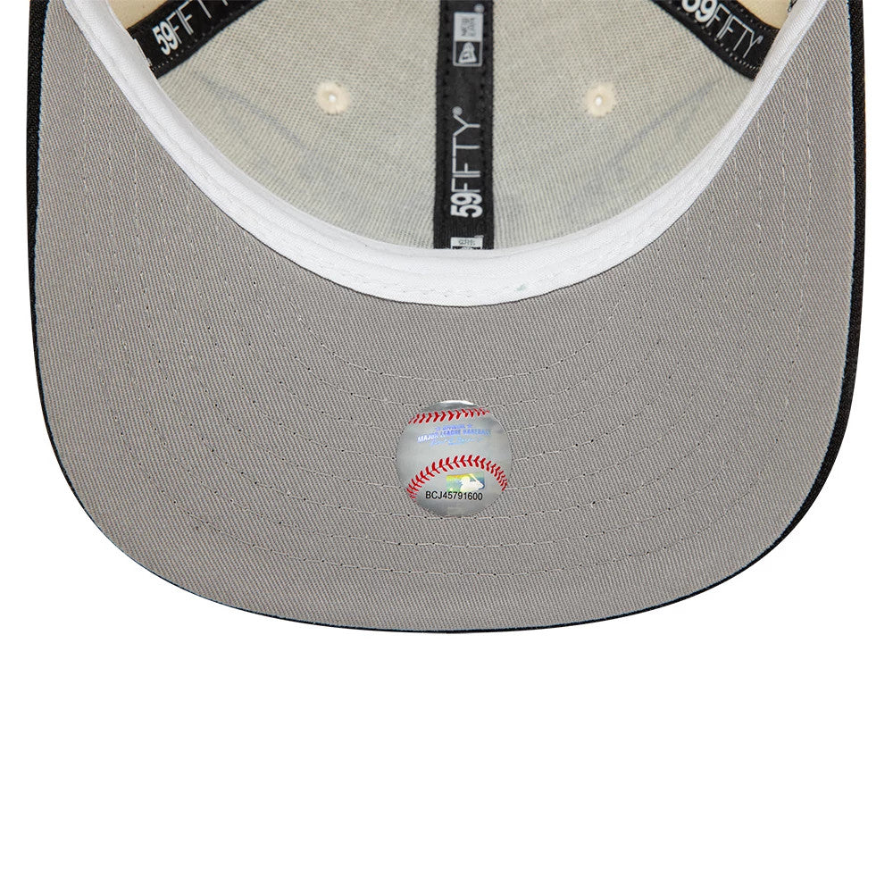 Pittsburgh Pirates MLB Team Wings Light Beige New Era 59FIFTY Fitted Cap, inside view showing black taping with white 59FIFTY branding, a white sweatband, and a grey undervisor featuring a holographic authenticity sticker.