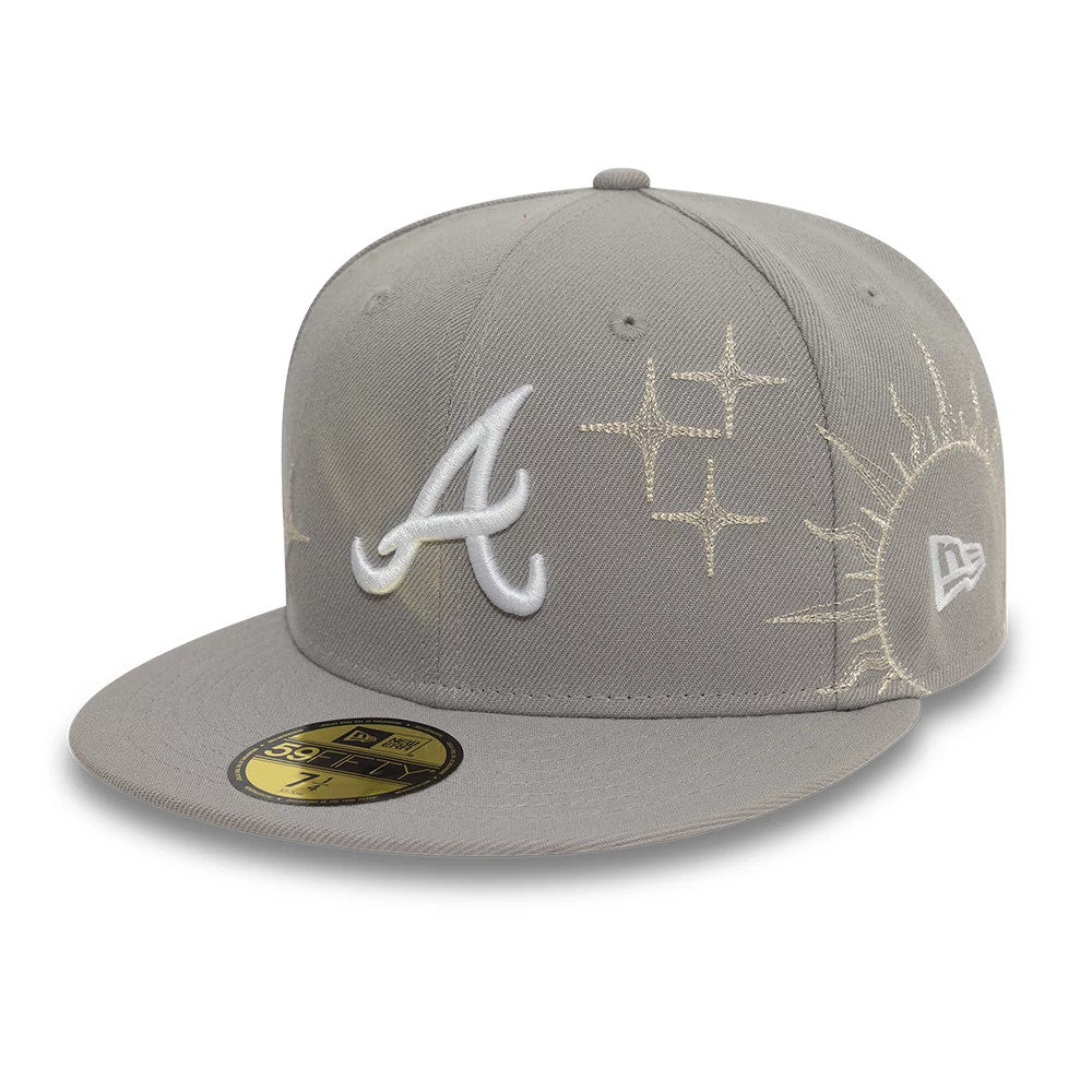 Atlanta Braves MLB Zodiac Grey New Era 59FIFTY Fitted Cap, front view showing raised white A logo embroidery on the front panel, with gold star and sun designs on the crown and a gold 59FIFTY size sticker on the visor.
