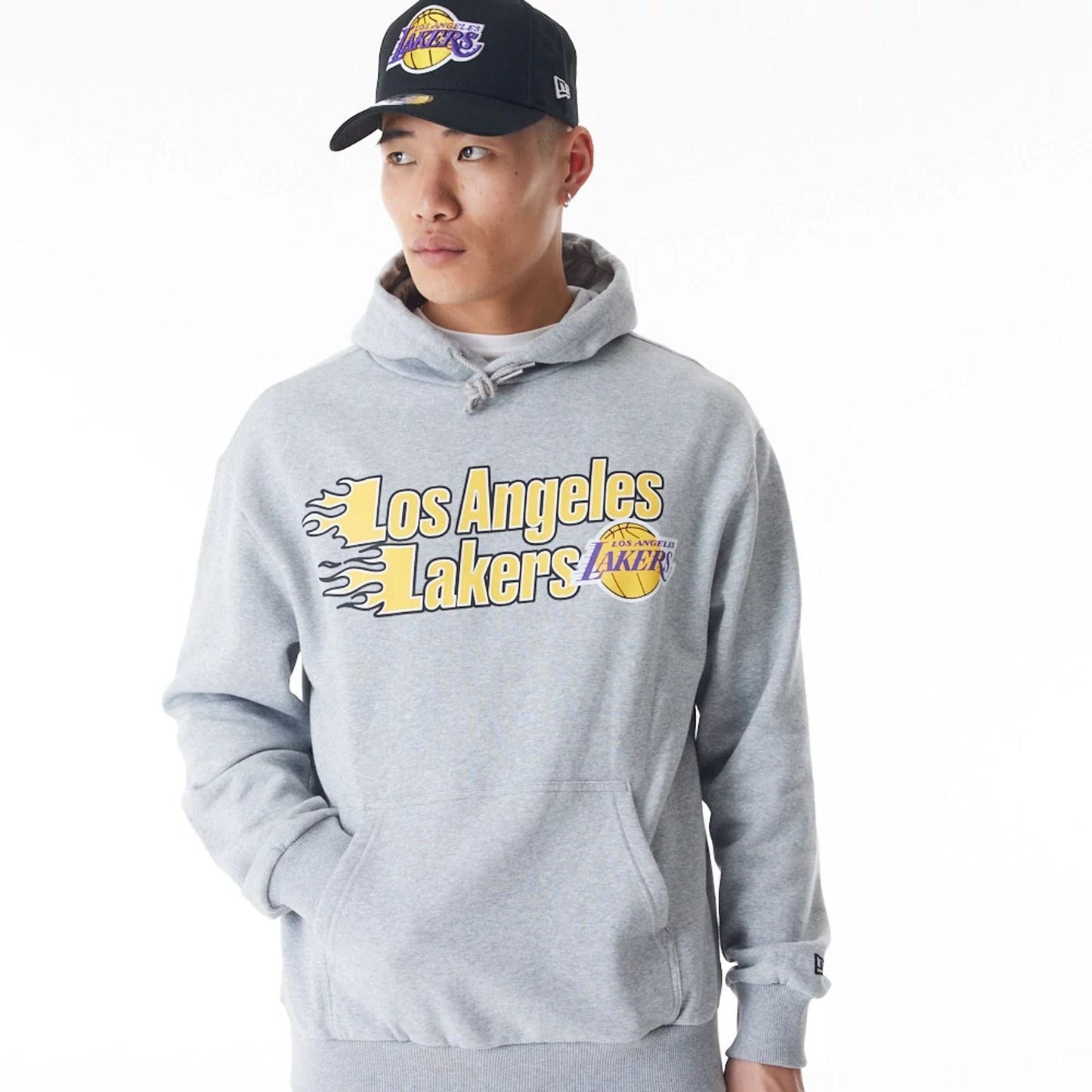 The Male model is wearing LA Lakers NBA Flame Print Grey Oversized Pullover Hoodie 7