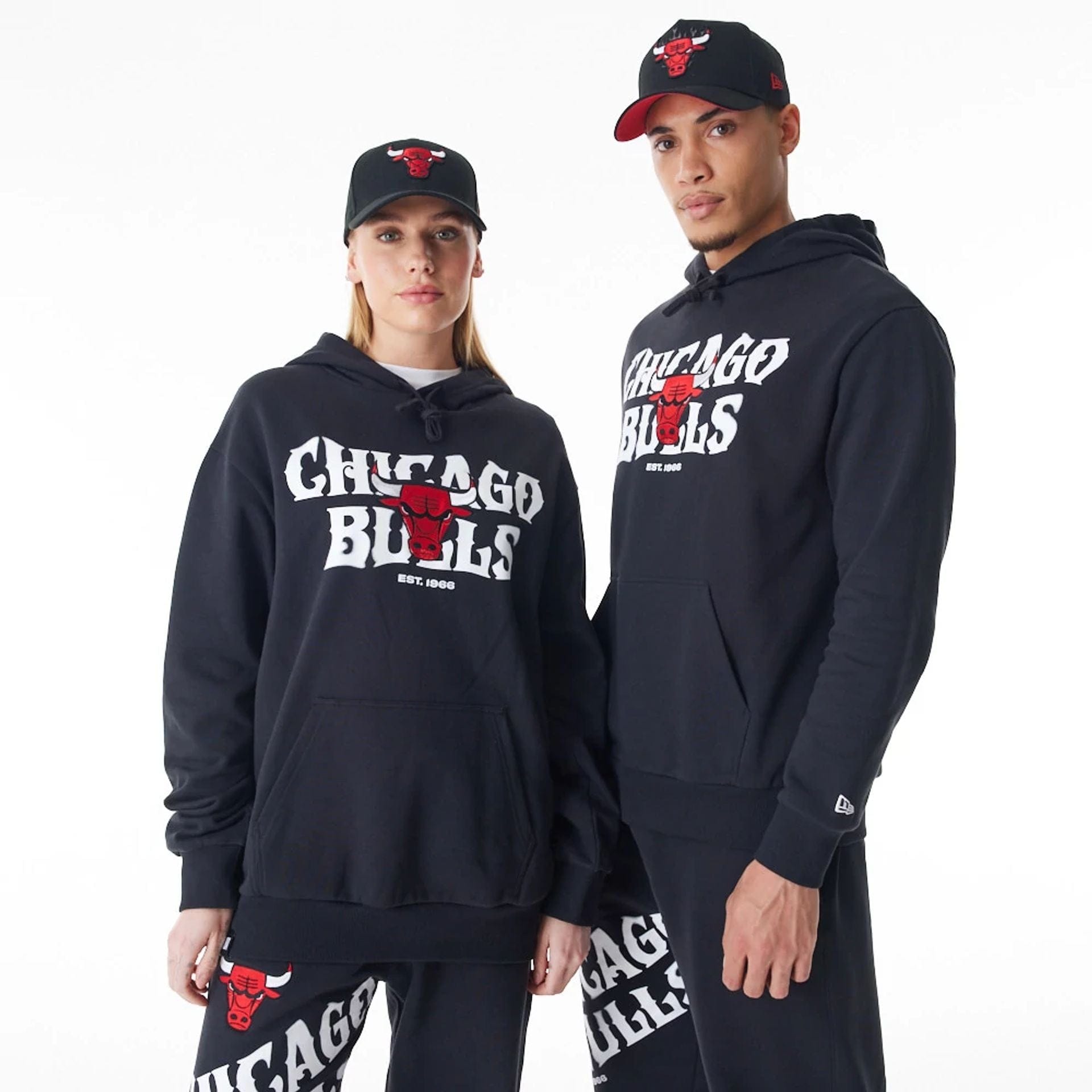 The Male model is wearing Chicago Bulls NBA Graphic Black Oversized Pullover Hoodie 1
