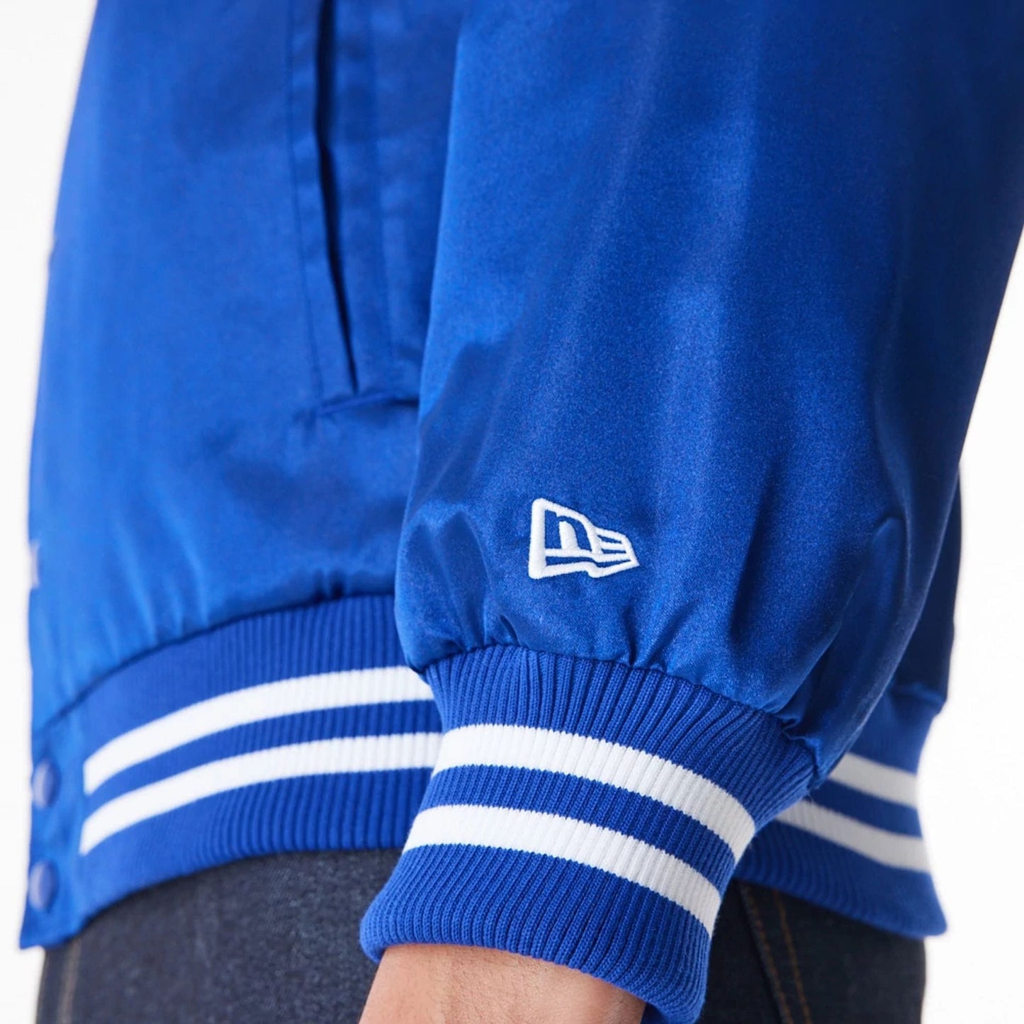 The Male model is wearing New York Giants NFL Blue Satin Bomber Jacket 11