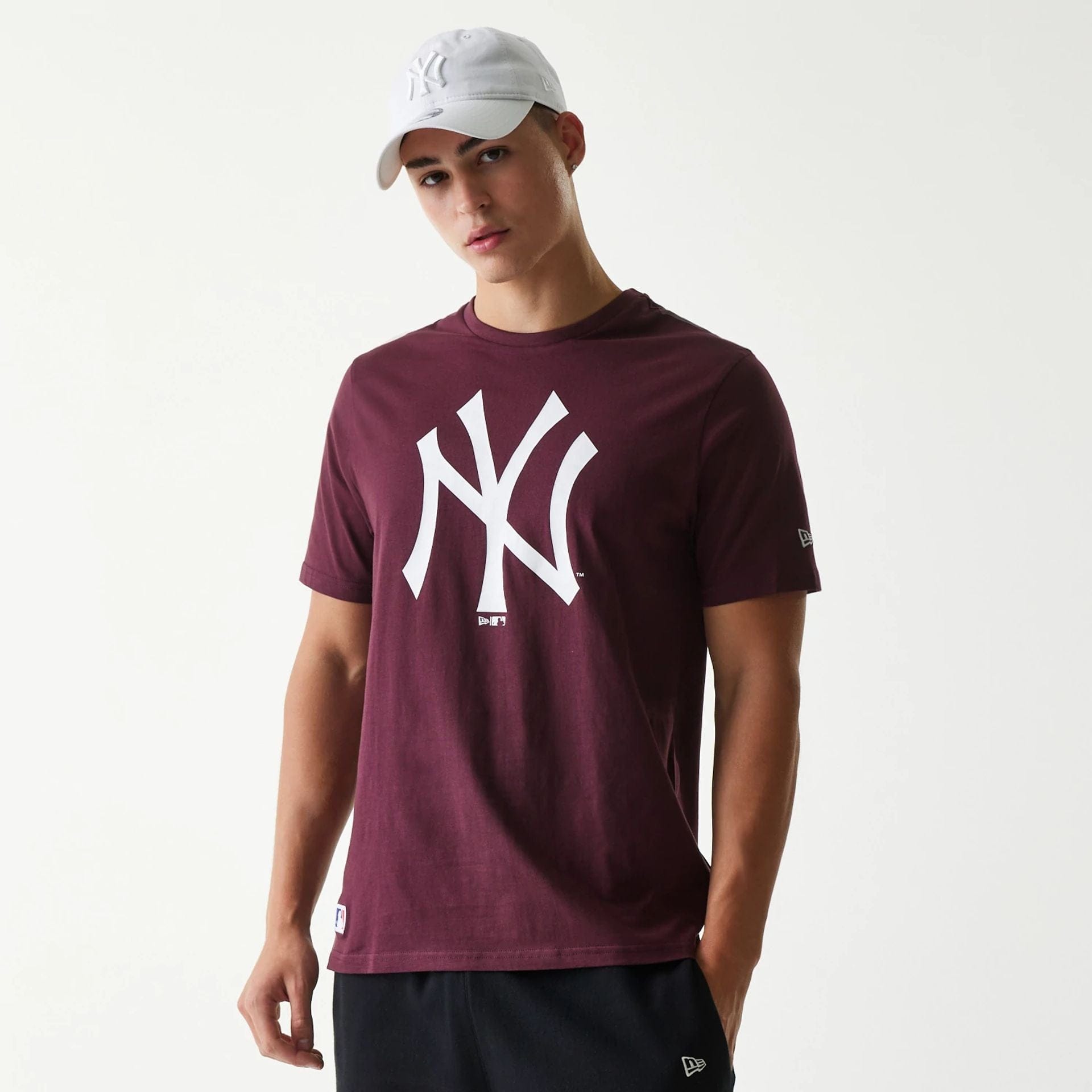 The Male model is wearing New York Yankees MLB Regular Dark Purple T-Shirt 1