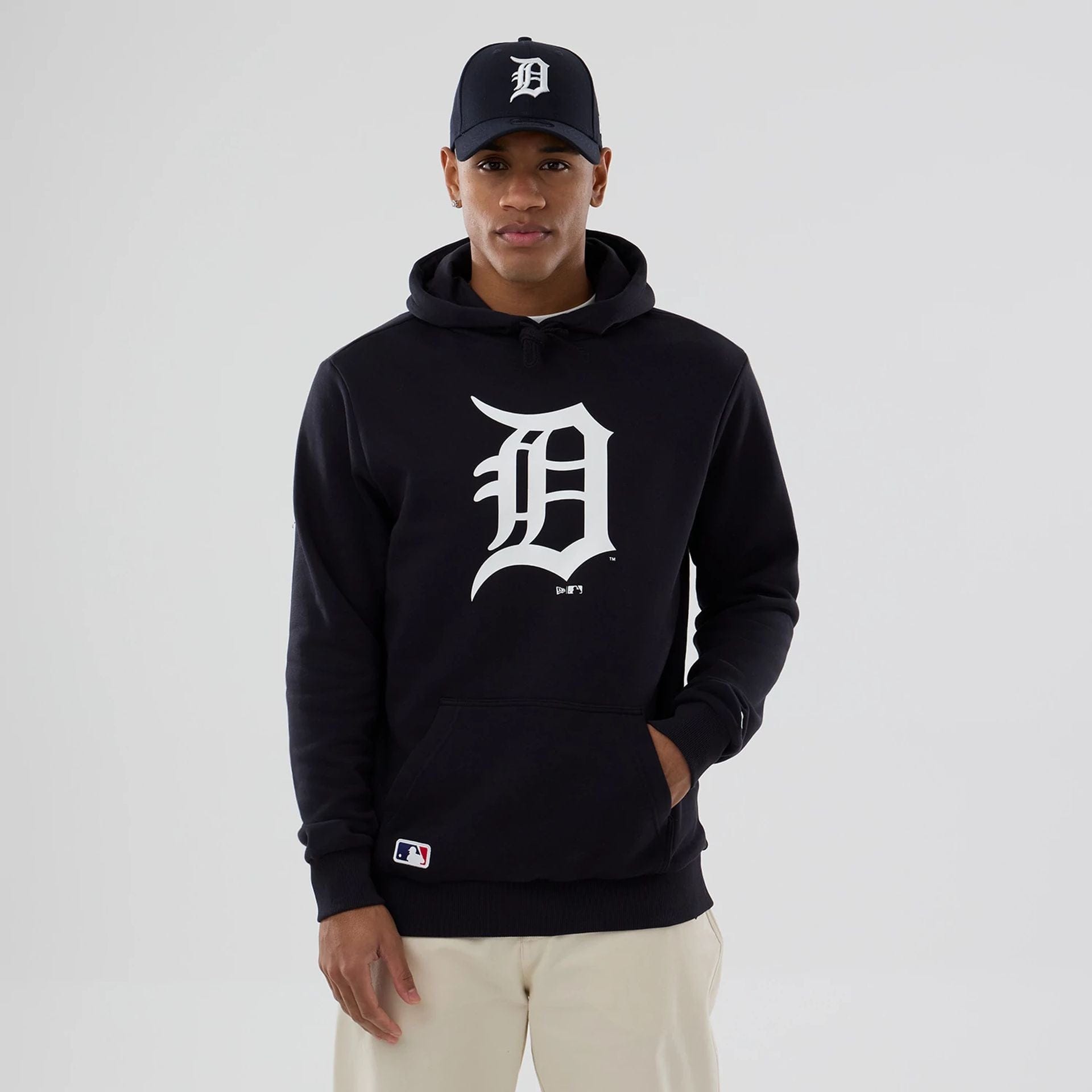 The Male model is wearing Detroit Tigers MLB Navy Pullover Hoodie 1