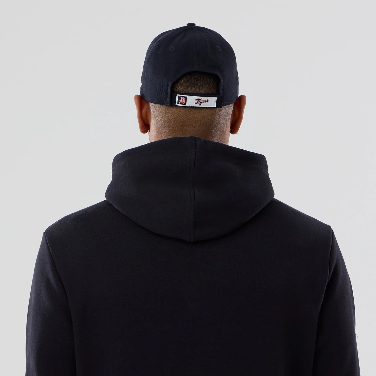 The Male model is wearing Detroit Tigers MLB Navy Pullover Hoodie 7