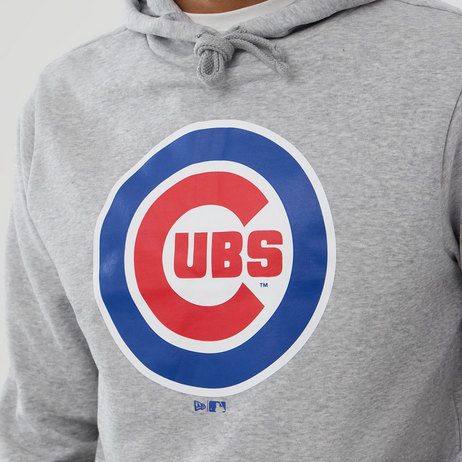 New Era Chicago Cubs MLB Grey Pullover Hoodie, front view showing a large red and blue Cubs logo centred on the chest, a drawstring at the neckline, and a debossed New Era logo near the lower edge.
