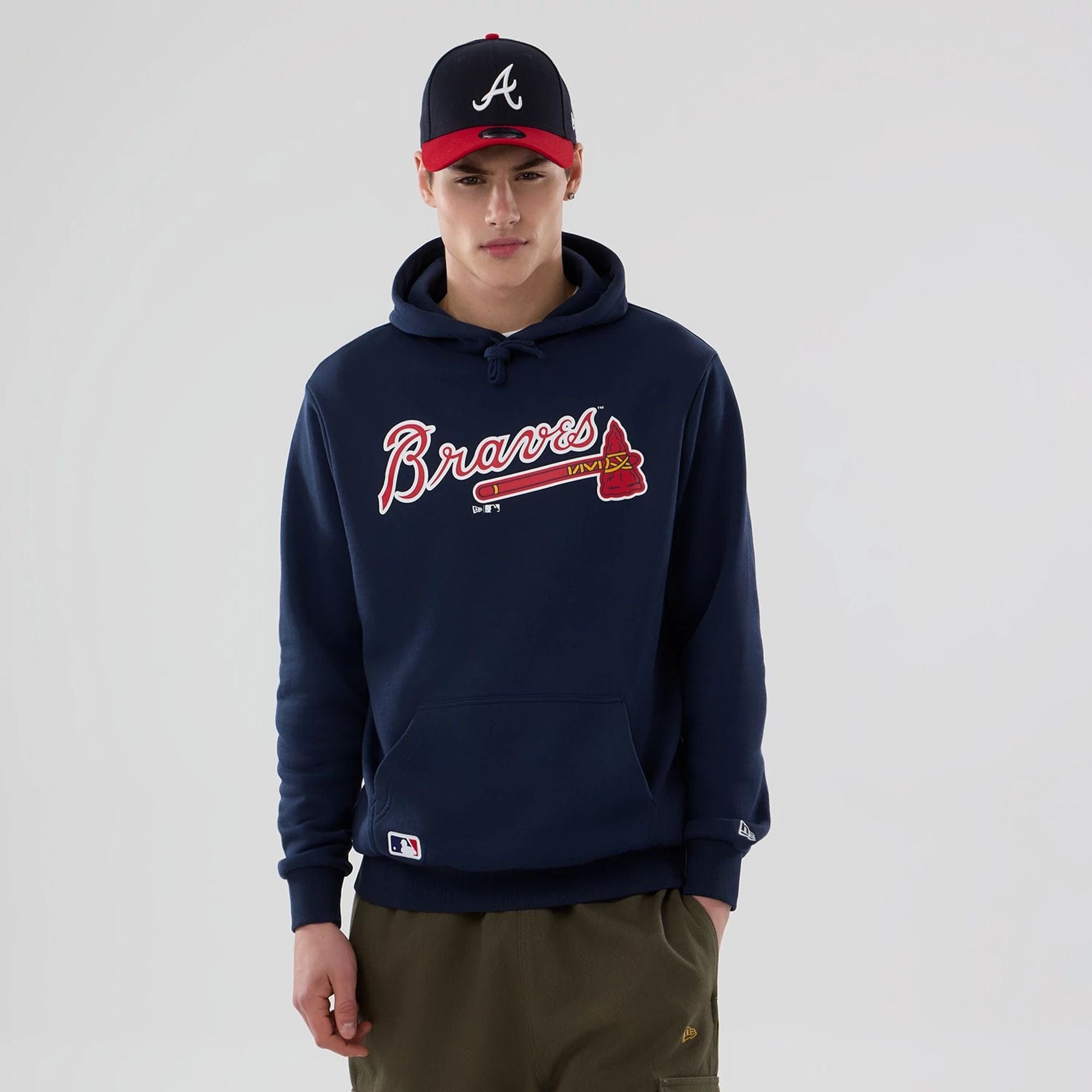 The Male model is wearing Atlanta Braves MLB Dark Blue Pullover Hoodie 1
