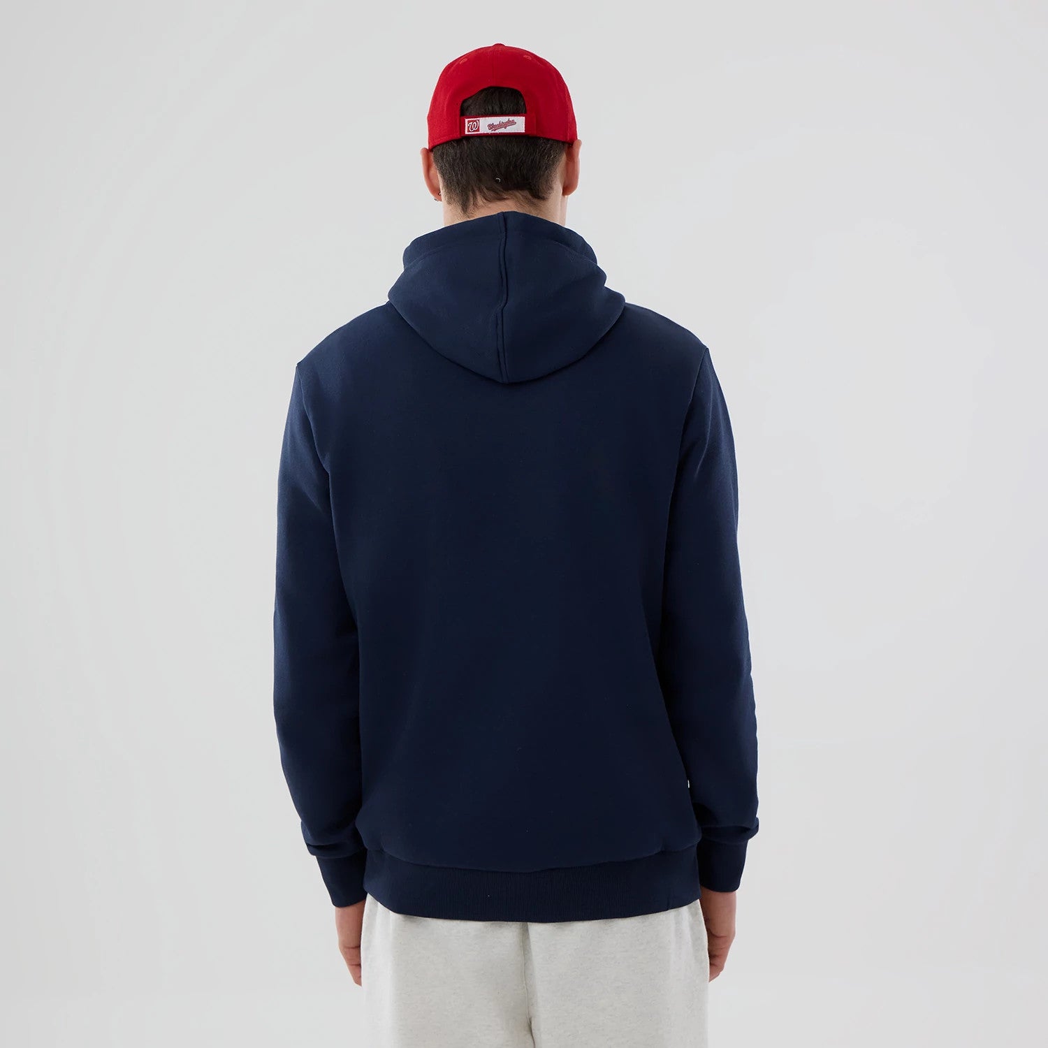 The Male model is wearing Washington Nationals MLB Dark Blue Pullover Hoodie 2
