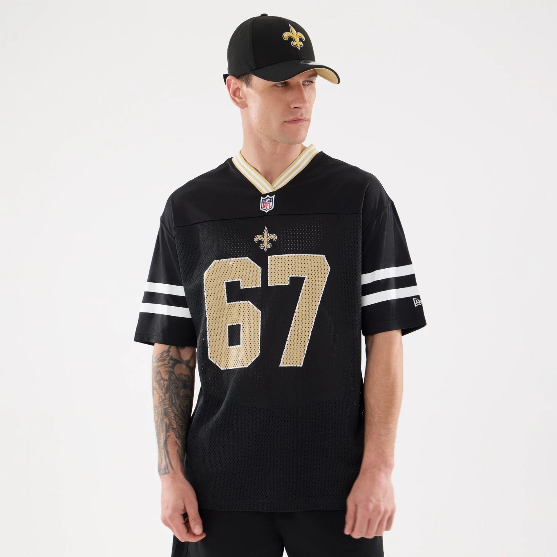 The Male model is wearing New Orleans Saints NFL Mesh Black Mesh Jersey 1