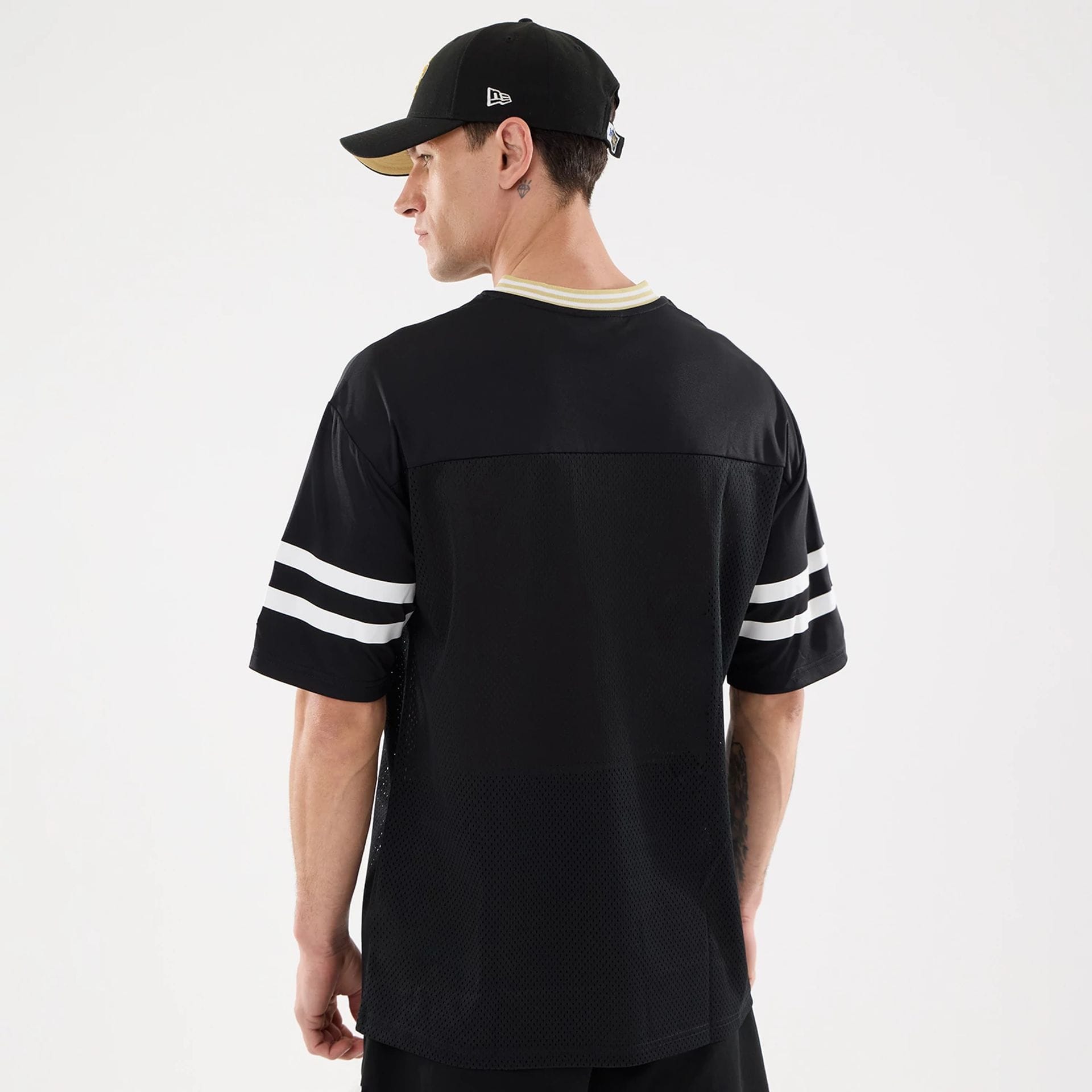 The Male model is wearing New Orleans Saints NFL Mesh Black Mesh Jersey 2