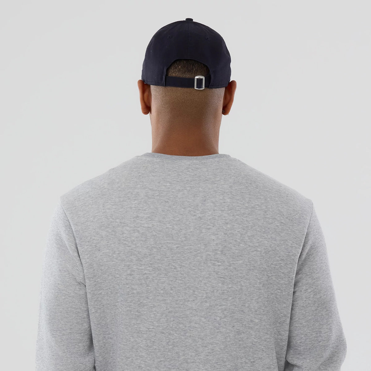 The Male model is wearing MLB Generic Logo Grey Crew Neck Sweater 7