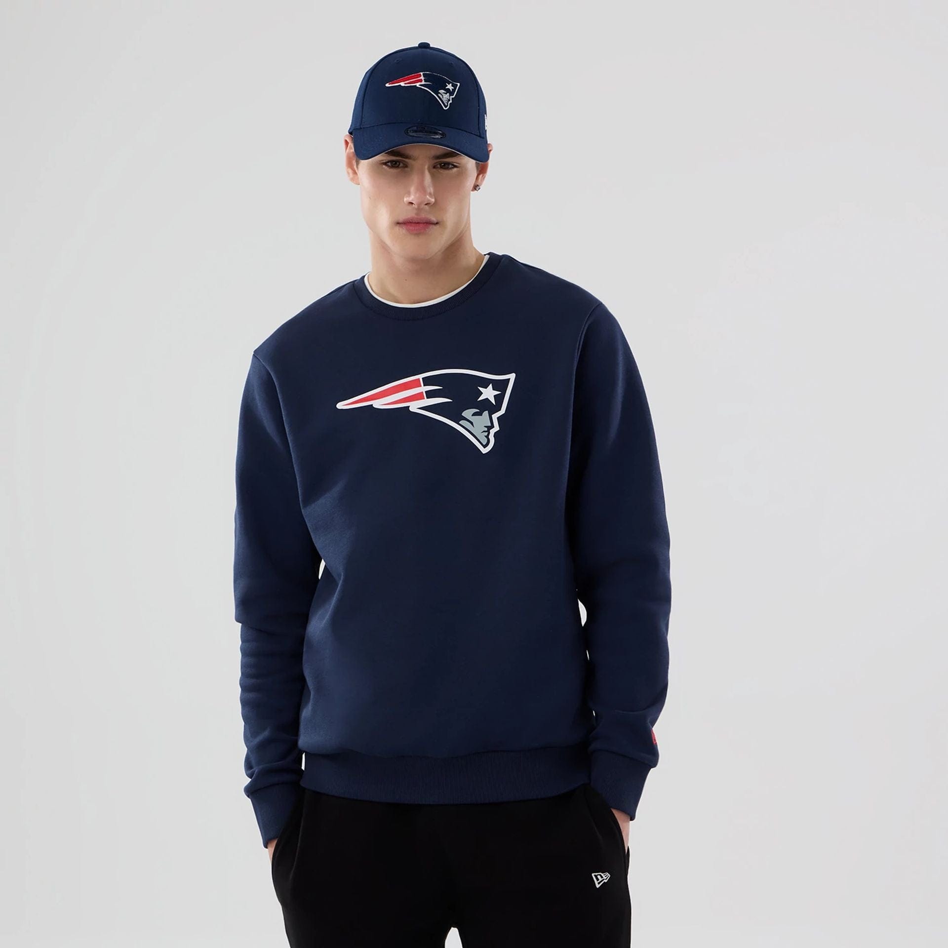 The Male model is wearing New England Patriots NFL Dark Blue Crew Neck Sweater 1