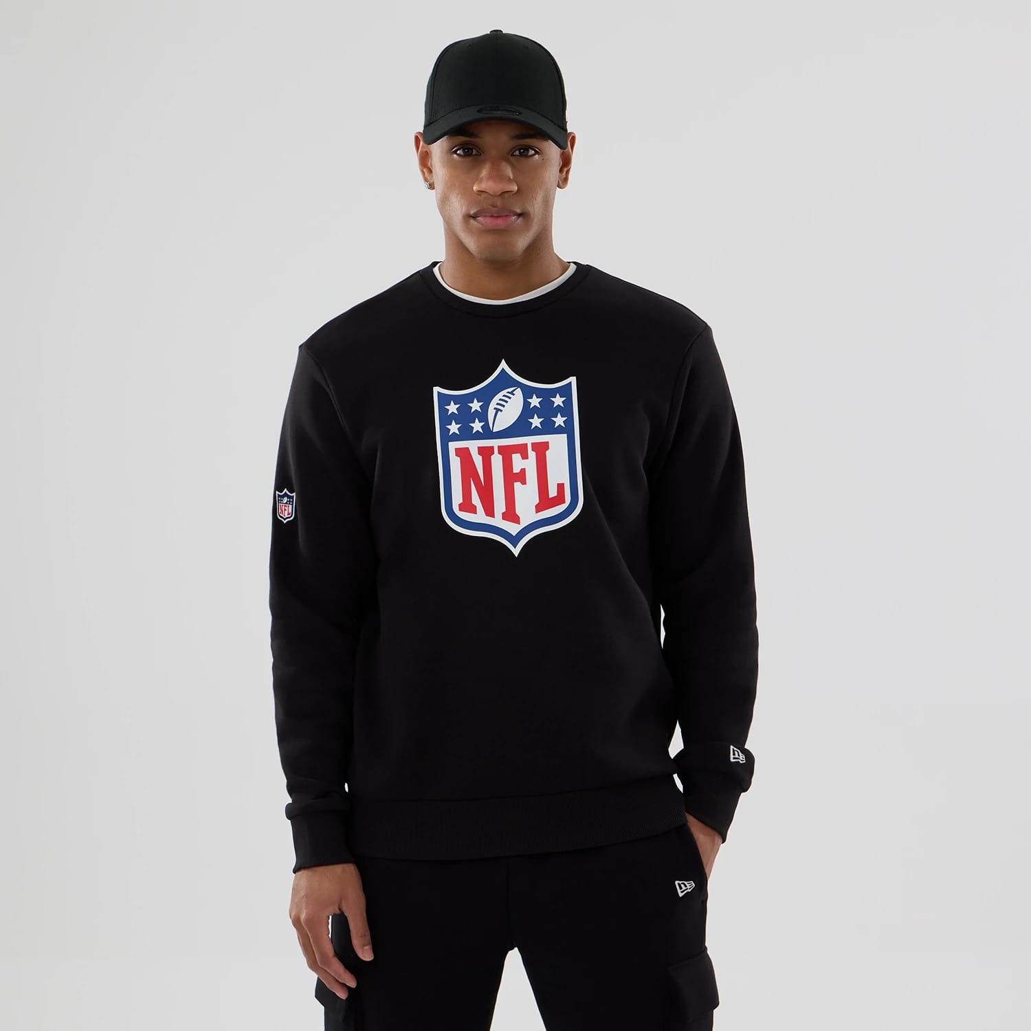 The Male model is wearing NFL Generic Logo Black Crew Neck Sweater 1