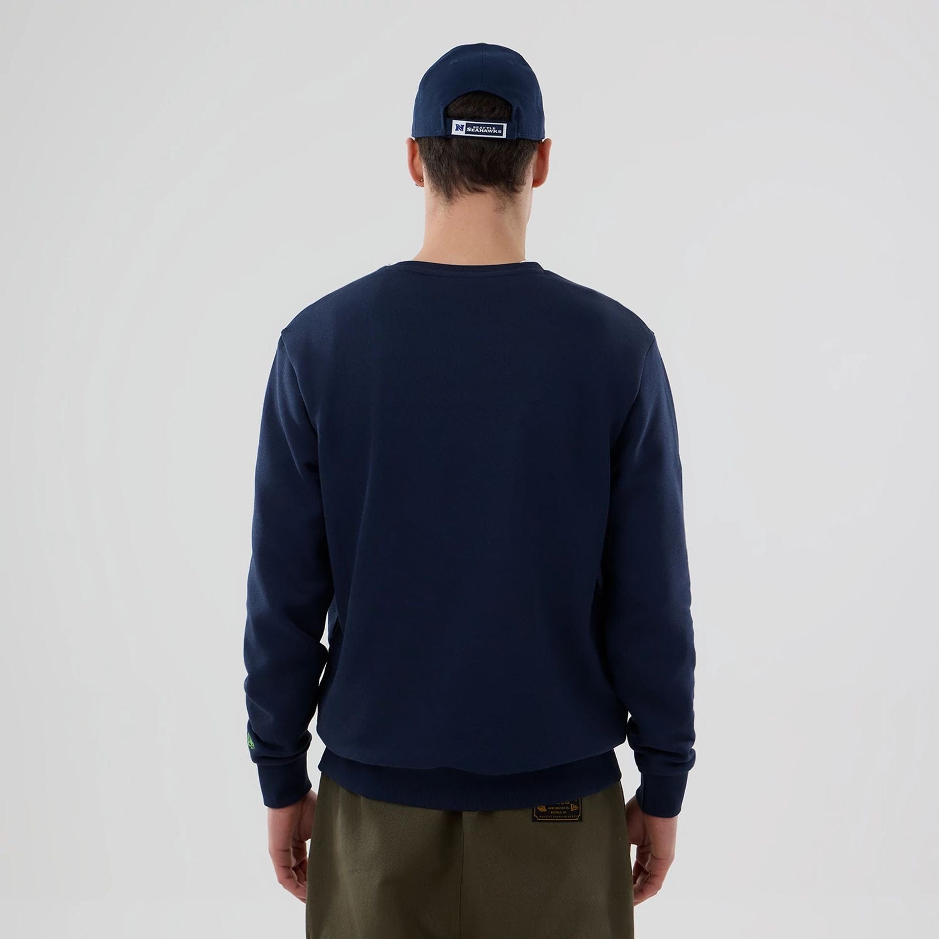 The Male model is wearing Seattle Seahawks NFL Dark Blue Crew Neck Sweater 2