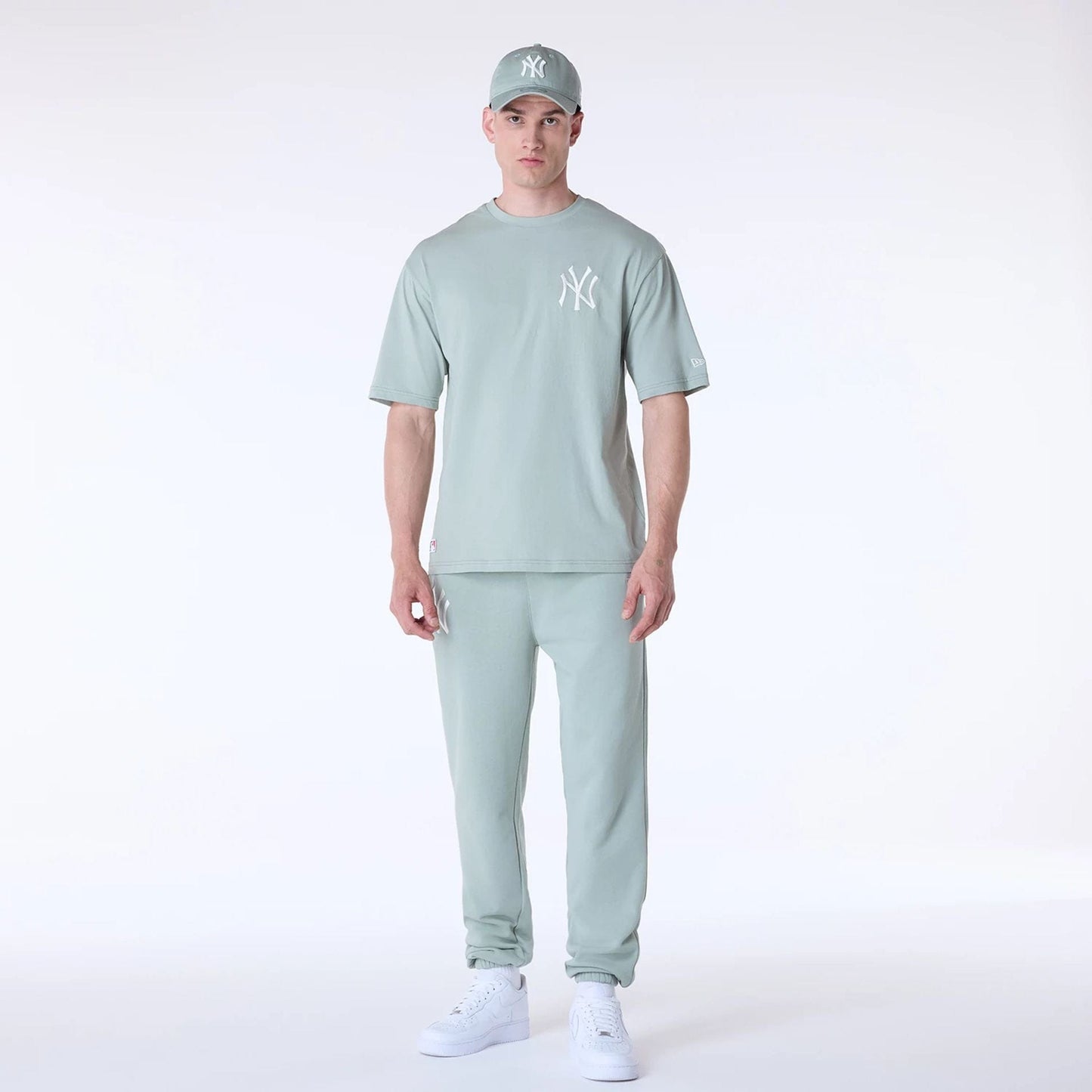 The Male model is wearing New York Yankees MLB League Essential Pastel Green Oversized T-Shirt 8