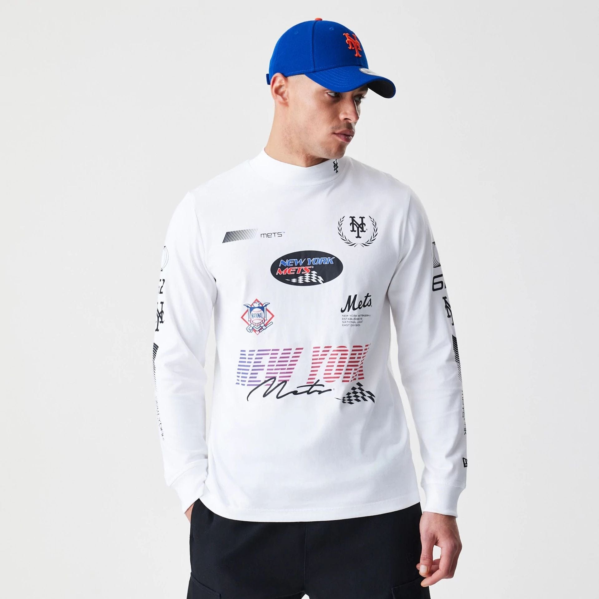 The Male model is wearing New York Mets Modern Driver White Long Sleeve T-Shirt 1