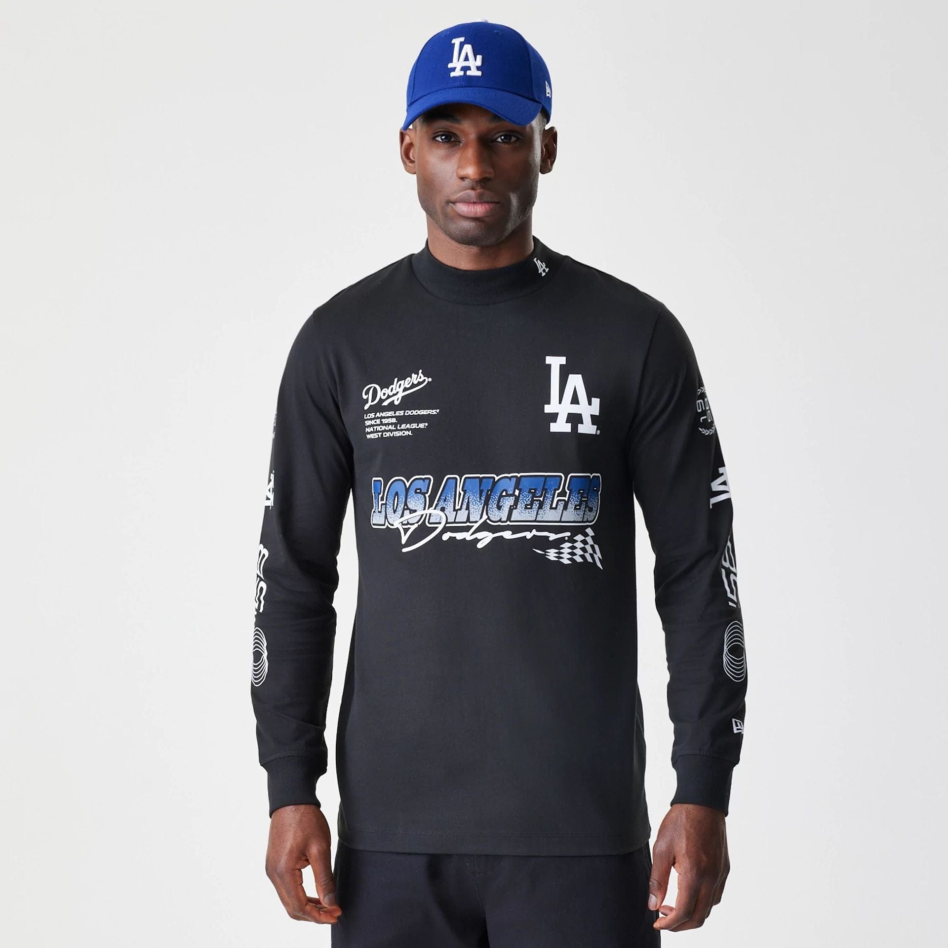 The Male model is wearing LA Dodgers Modern Driver Black Long Sleeve T-Shirt 1