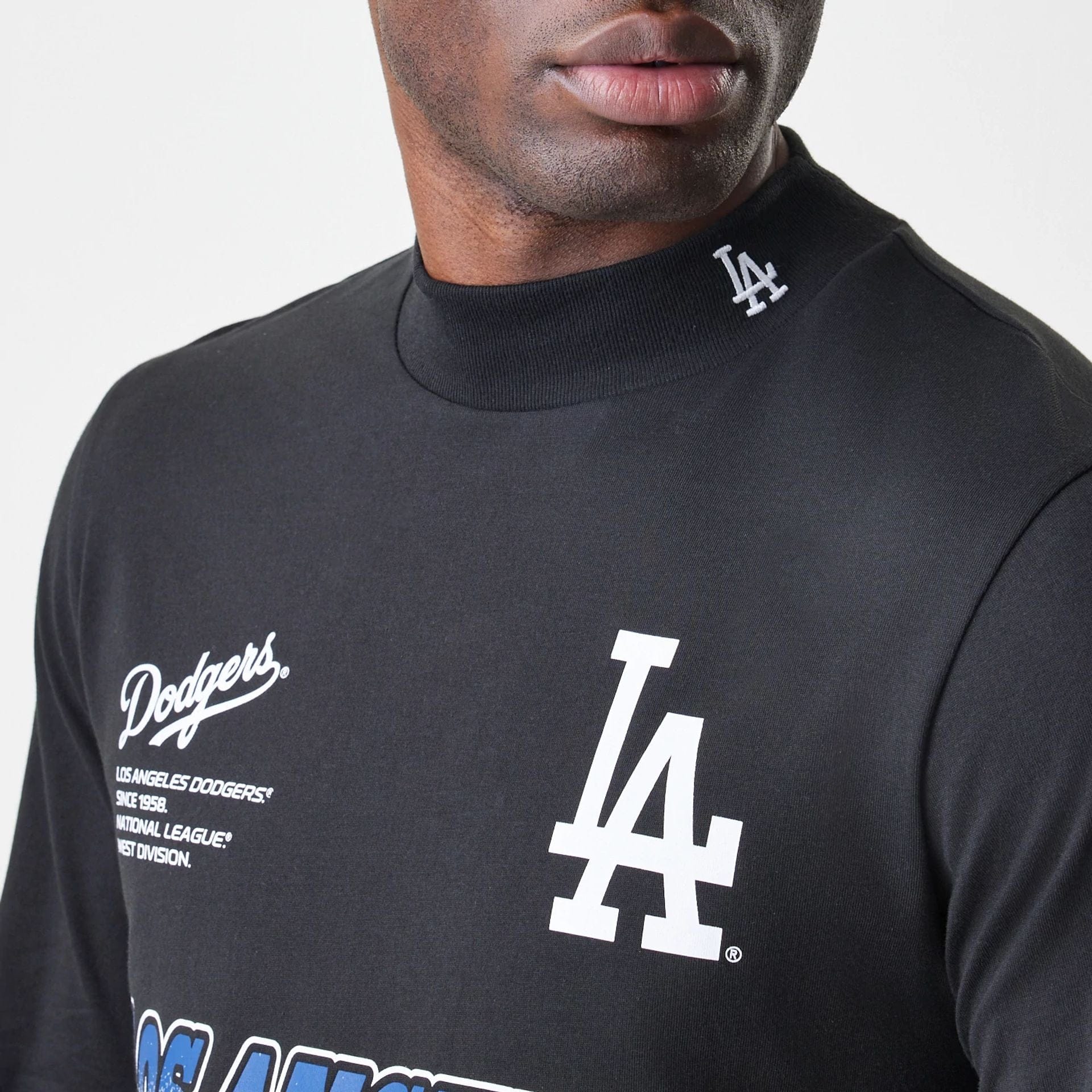 The Male model is wearing LA Dodgers Modern Driver Black Long Sleeve T-Shirt 2