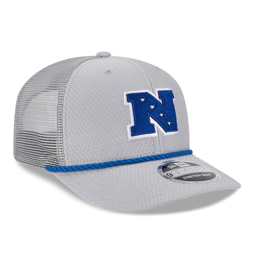 NFL Pro Bowl 2025 NFC Logo Grey New Era 9SEVENTY Trucker Stretch Snap Cap, three-quarter view with blue and white embroidered N logo on the front panel, grey mesh back, and 9SEVENTY size sticker on the flat visor.