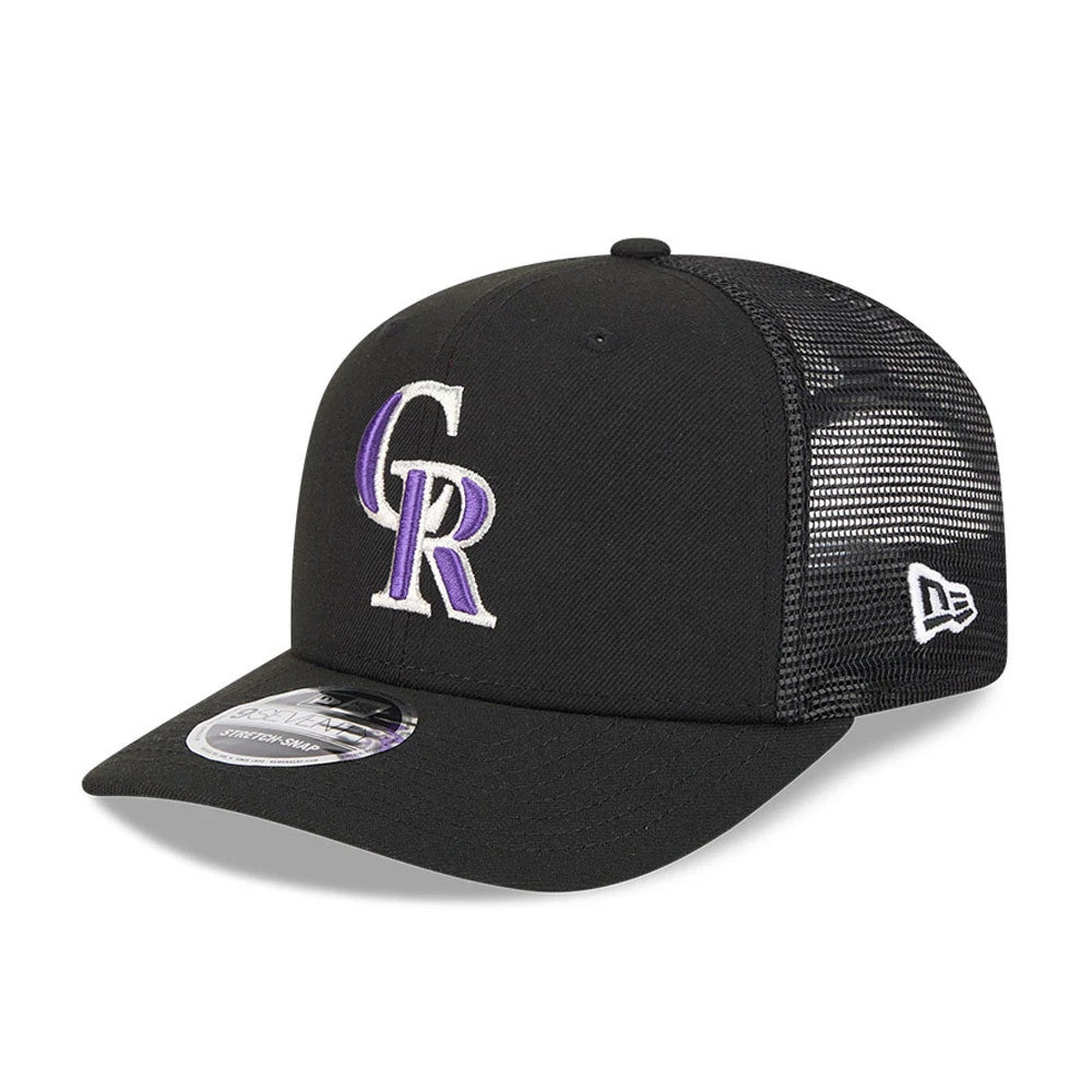 Colorado Rockies MLB Evergreen Black New Era 9SEVENTY Stretch Snap Adjustable Cap, three-quarter view showing the purple and white embroidered CR logo on the front panel, black mesh side panels, and the New Era flag logo embroidered on the left side.