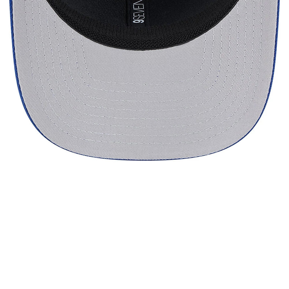 Kansas City Royals MLB Evergreen Blue New Era 9SEVENTY Stretch Snap Adjustable Cap, inside view showing black sweatband and grey undervisor with detailed stitching, positioned alongside the 9SEVENTY taping.