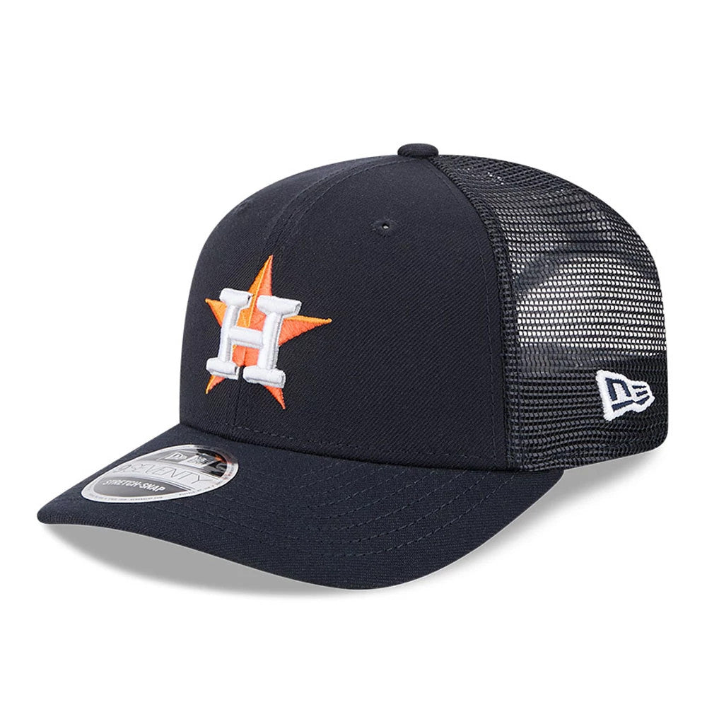 Houston Astros MLB Evergreen Navy New Era 9SEVENTY Stretch Snap Adjustable Cap, three-quarter view showing the orange and white embroidered H logo on the front panel, mesh back panels, and a 9SEVENTY size sticker on the navy curved visor.