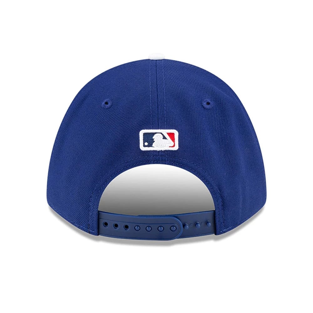LA Dodgers MLB Player Replica Dark Blue New Era 9FORTY M-Crown Adjustable Cap, rear view showing the embroidered MLB Batterman logo centred at the back above the adjustable strap on the structured dark blue crown.