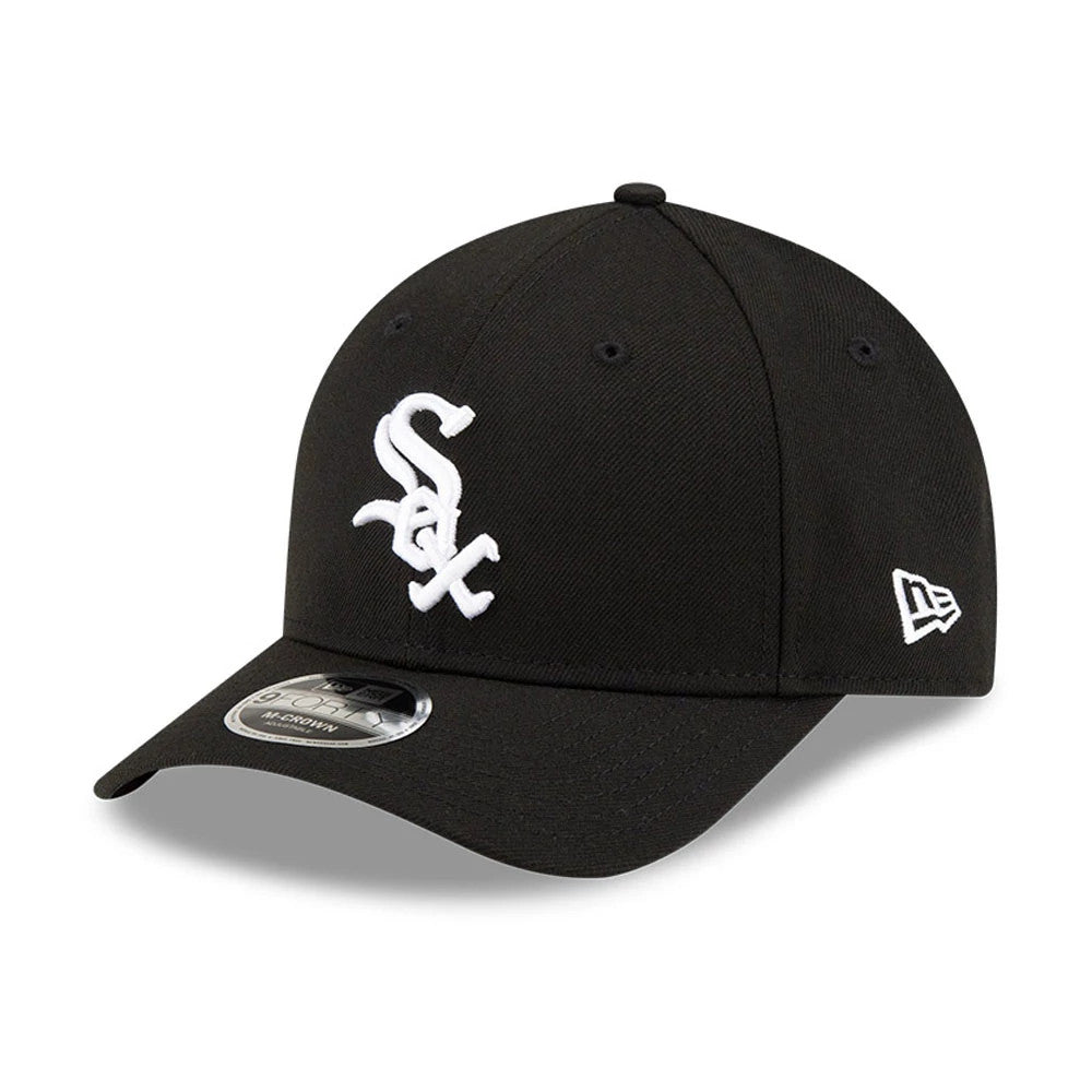 Chicago White Sox MLB Player Replica Black New Era 9FORTY M-Crown Adjustable Cap, three-quarter view showing the raised white front panel logo, curved black visor with 9FORTY size sticker, and New Era flag logo on the left side.