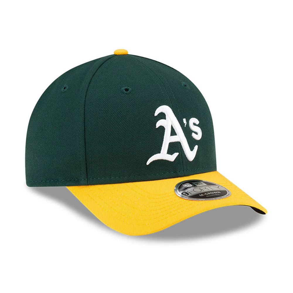 Athletics MLB Player Replica Dark Green New Era 9FORTY M-Crown Adjustable Cap, three-quarter view showing the raised white A's logo on the dark green front panel, contrasting yellow visor with a 9FORTY size sticker, and a top button.