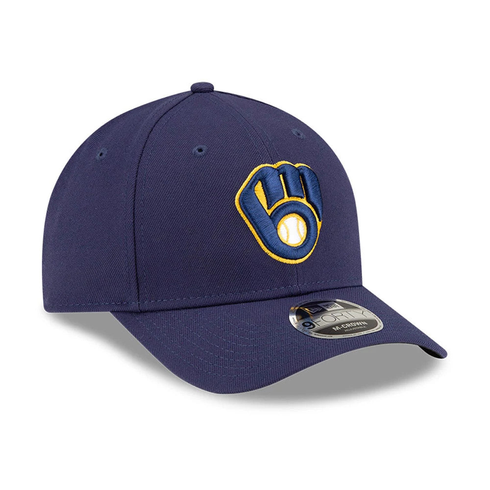 Milwaukee Brewers MLB Player Replica Navy New Era 9FORTY M-Crown Adjustable Cap, three-quarter view showing the raised yellow and blue glove logo on the front panel, with a navy curved visor and a 9FORTY size sticker on top.