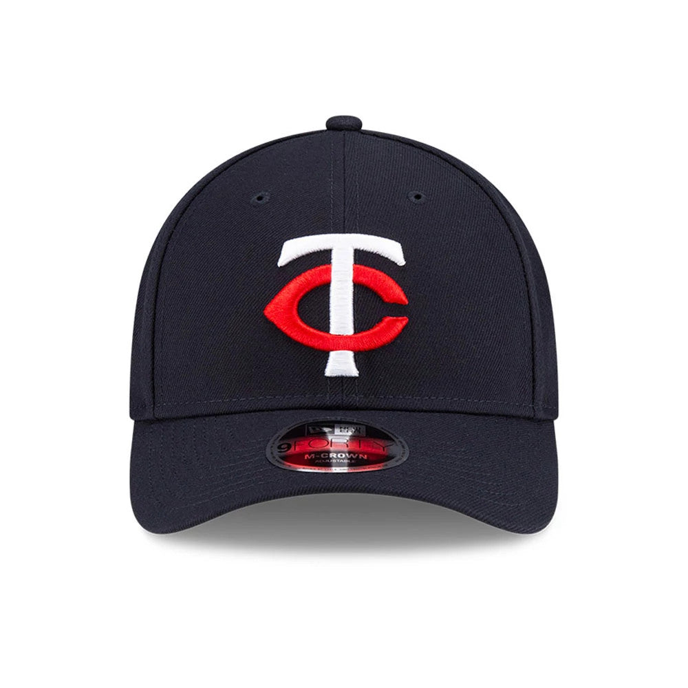 Minnesota Twins MLB Player Replica Navy New Era 9FORTY M-Crown Adjustable Cap, front view showing the raised white and red TC logo embroidered on the front panel above the curved visor with a 9FORTY size sticker.