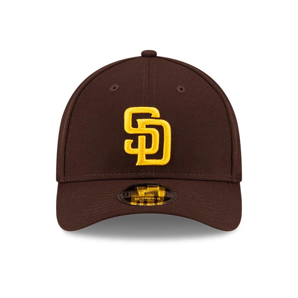 San Diego Padres MLB Player Replica Dark Brown New Era 9FORTY M-Crown Adjustable Cap, front view with raised yellow SD logo embroidered on the front panel and a 9FORTY size sticker on the brown visor.