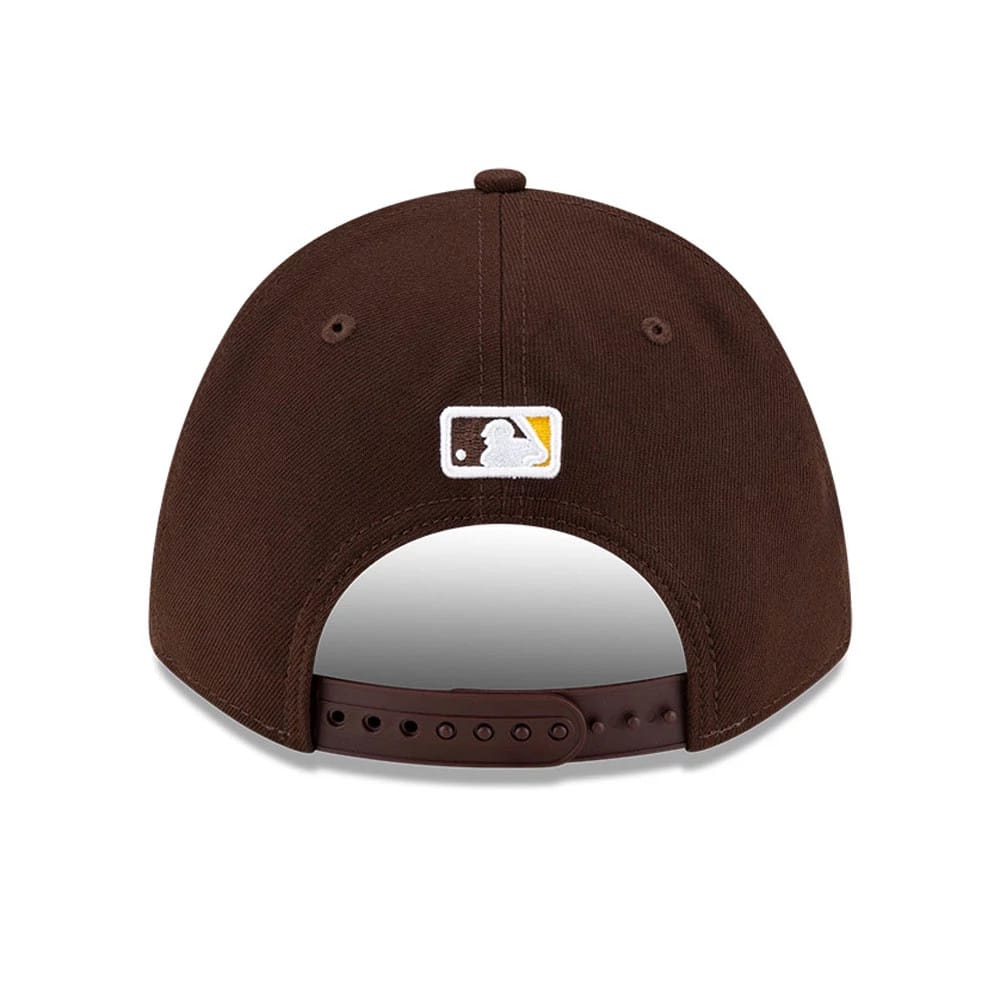 San Diego Padres MLB Player Replica Dark Brown New Era 9FORTY M-Crown Adjustable Cap, rear view showing the embroidered MLB Batterman logo at the centre back, positioned above the adjustable snap closure on the dark brown structured crown.
