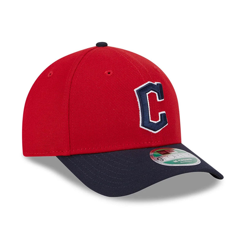 Cleveland Guardians MLB Player Replica Red New Era 9FORTY M-Crown Adjustable Cap, three-quarter view showing the raised navy C logo on the front panel, contrasting navy visor, and 9FORTY size sticker on the top of the visor.