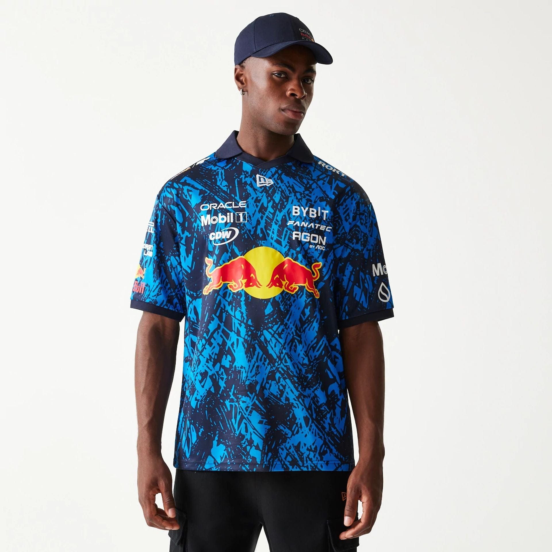 The Male model is wearing Red Bull Sim Racing Dark Blue V-Neck T-Shirt 1