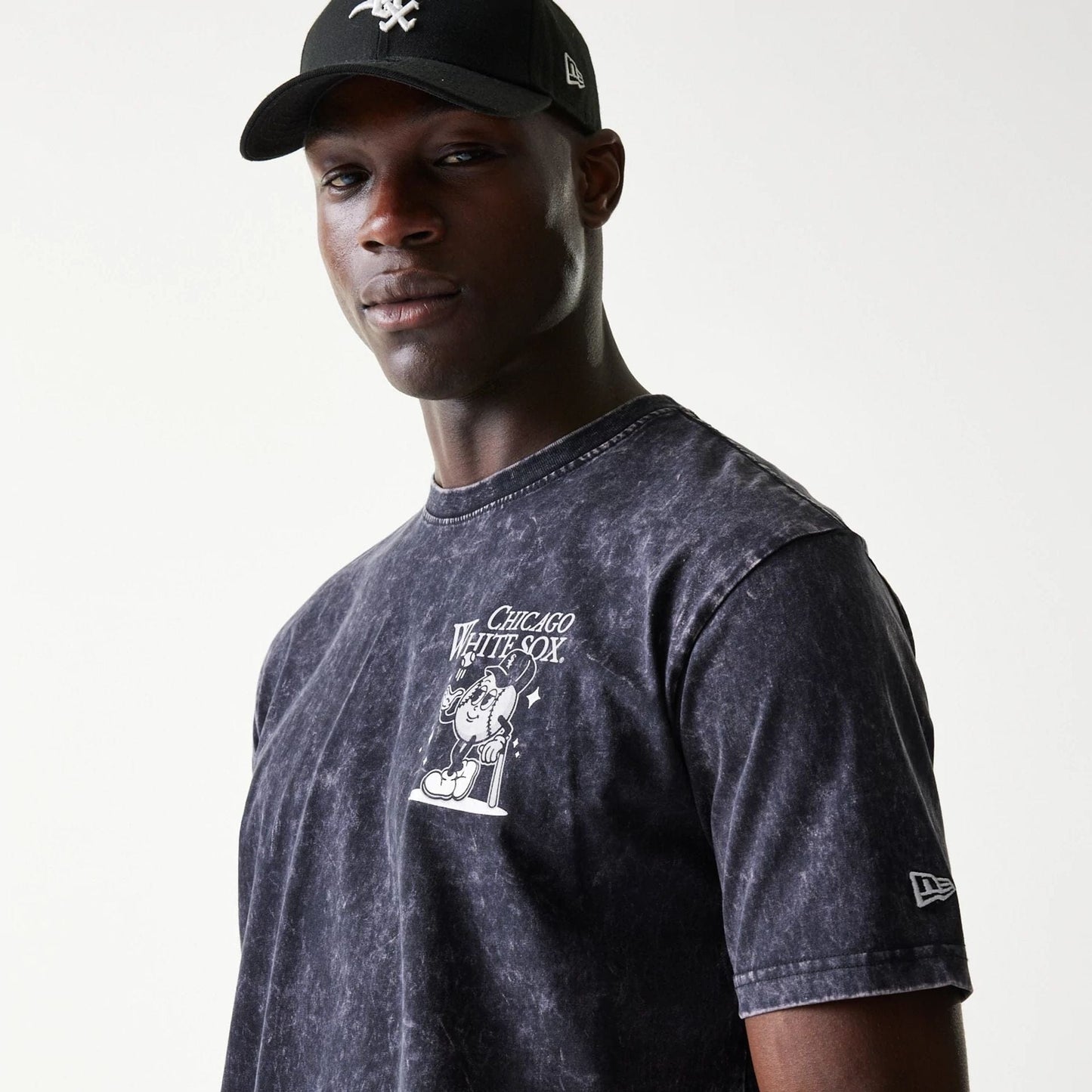 The Male model is wearing Chicago White Sox MLB Character Black T-Shirt 7