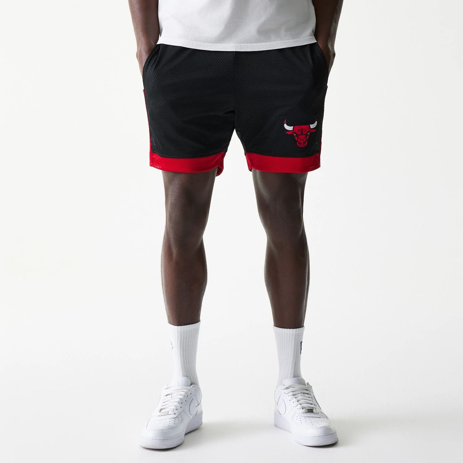 The Male model is wearing Chicago Bulls Sport Classic Black Shorts 1