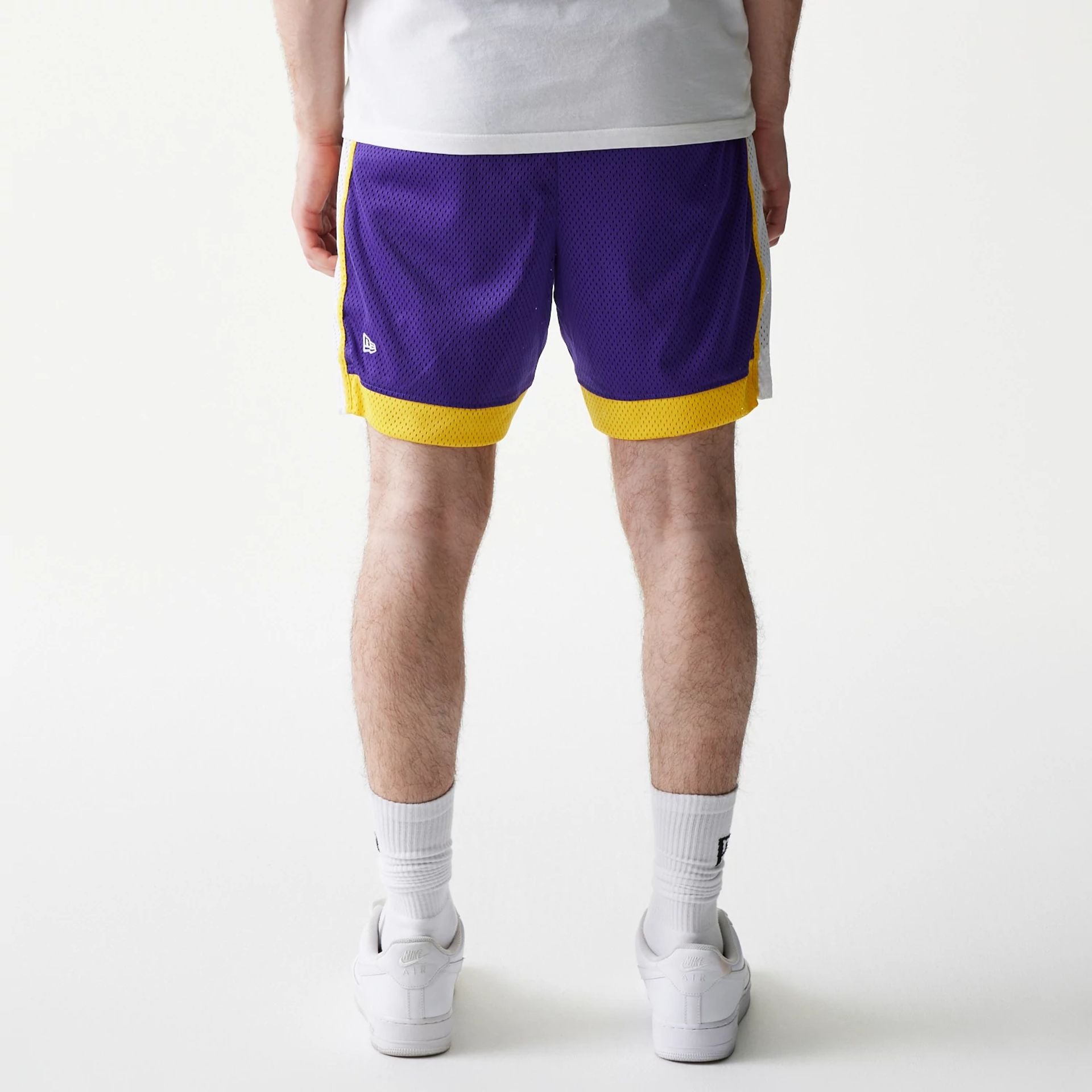 The Male model is wearing LA Lakers Sport Classic Purple Shorts 2