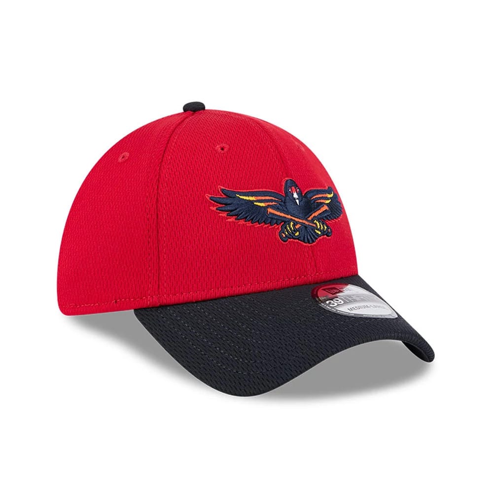 Toledo Mud Hens MiLB Batting Practice Red New Era 39THIRTY Stretch Fit Cap, three-quarter view showing the raised embroidered Mud Hens logo on the front panel, with a curved black visor and 39THIRTY size sticker.