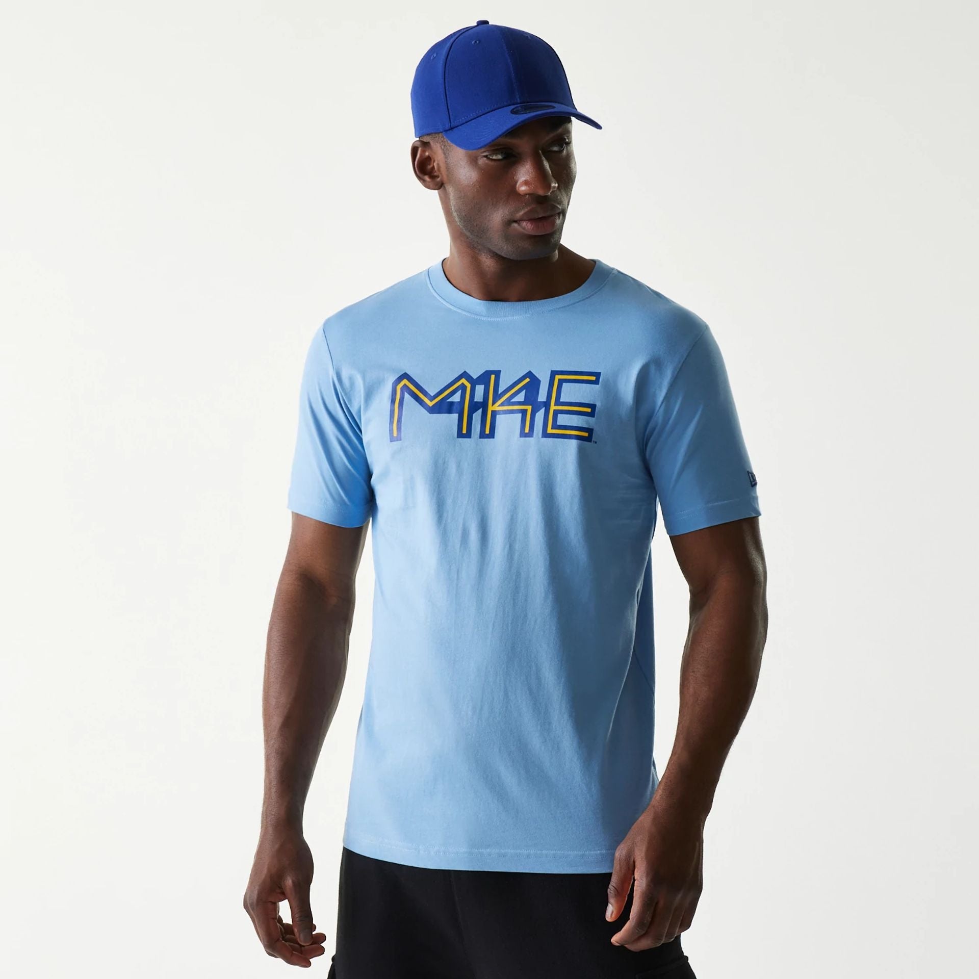 The Male model is wearing Milwaukee Brewers MLB City Connect Blue T-Shirt 1