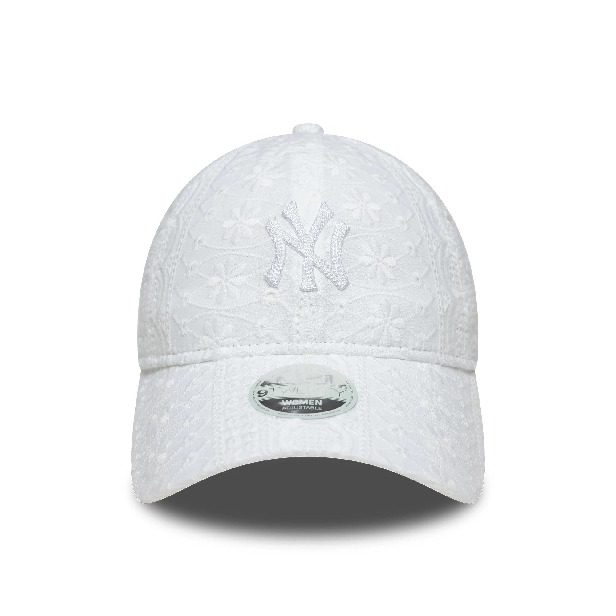New York Yankees Womens MLB Broderie White New Era 9TWENTY Adjustable Cap, front view showing white raised embroidered NY logo on the textured broderie crown, with a 9TWENTY size sticker on the curved visor.