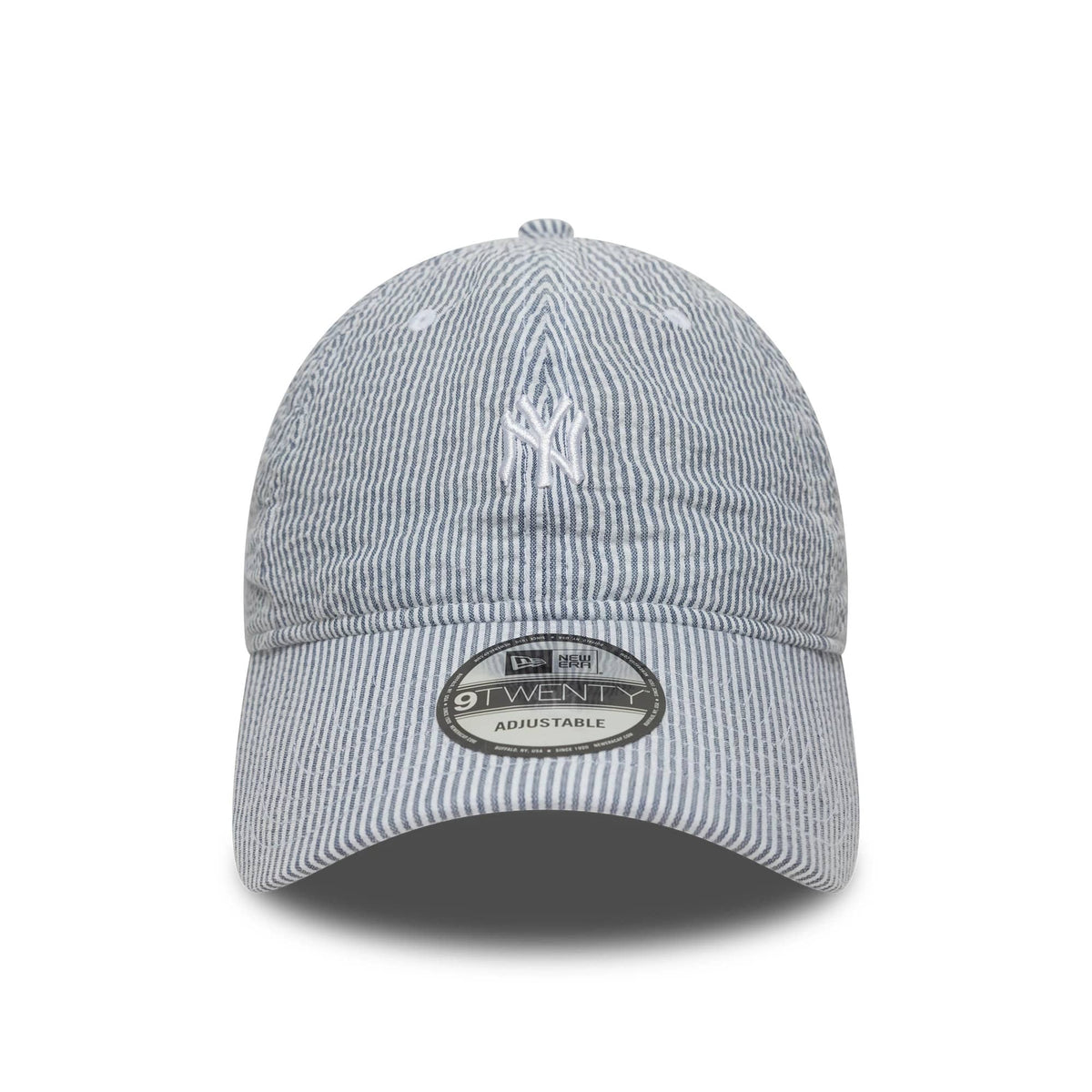 New York Yankees MLB Seersucker Navy New Era 9TWENTY Adjustable Cap, front view showing the white raised embroidered NY logo on the structured crown with a black and grey 9TWENTY size sticker on the curved visor.