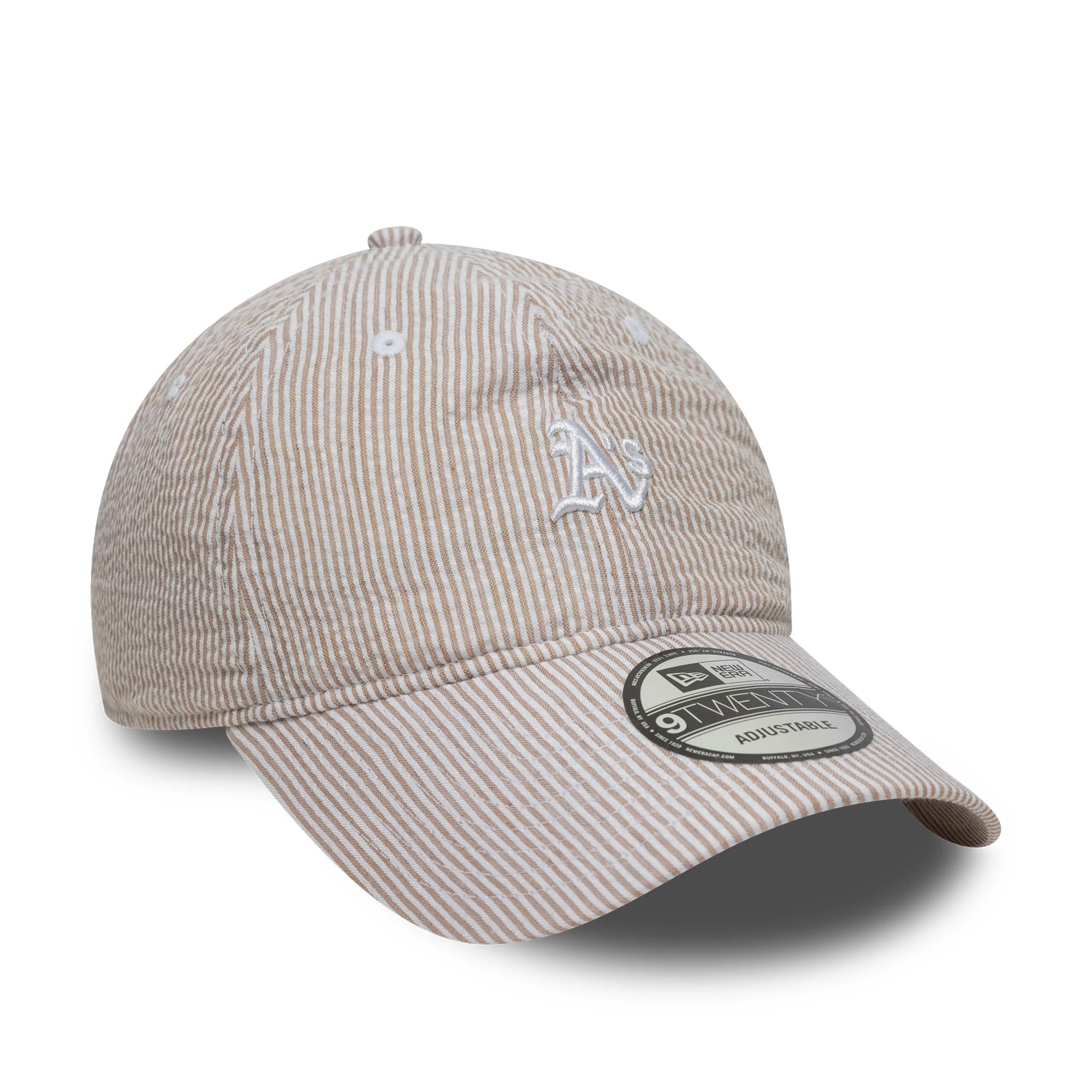 Athletics MLB Seersucker Light Beige New Era 9TWENTY Adjustable Cap, three-quarter view showing a raised white A's embroidered logo on the front panel, with a curved visor featuring a 9TWENTY size sticker.