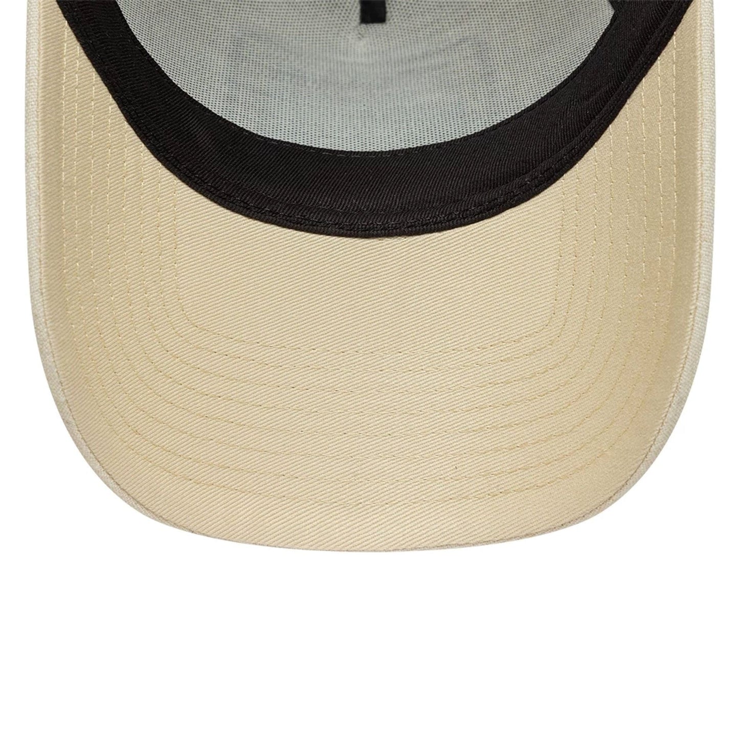 New Era Patch Line Cream 9FORTY E-Frame Adjustable Cap, inside view showing a black sweatband and grey undervisor with the structured crown design, featuring detailed stitching on the cream visor.