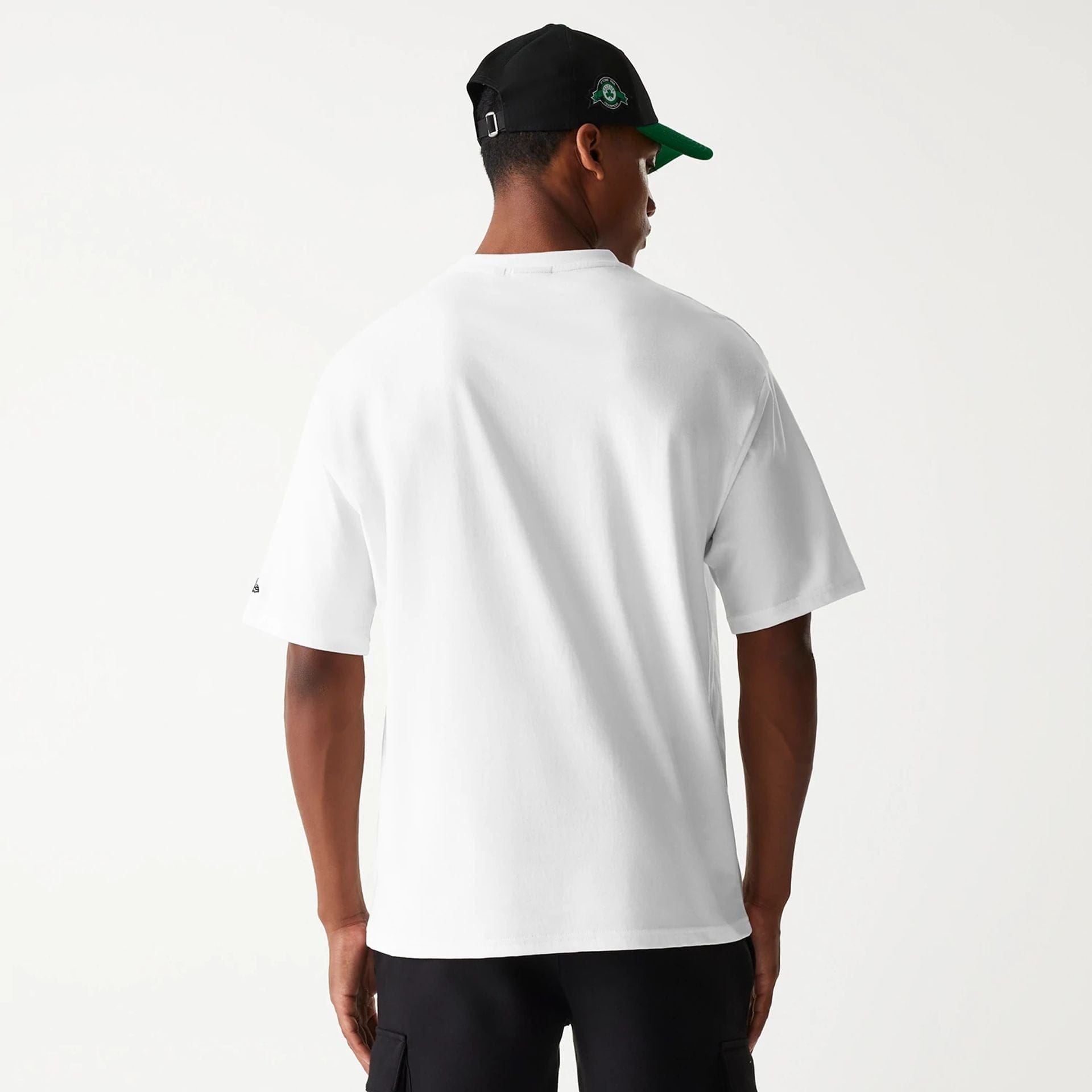 The Male model is wearing Boston Celtics NBA Palm Tree Open White Oversized T-Shirt 2