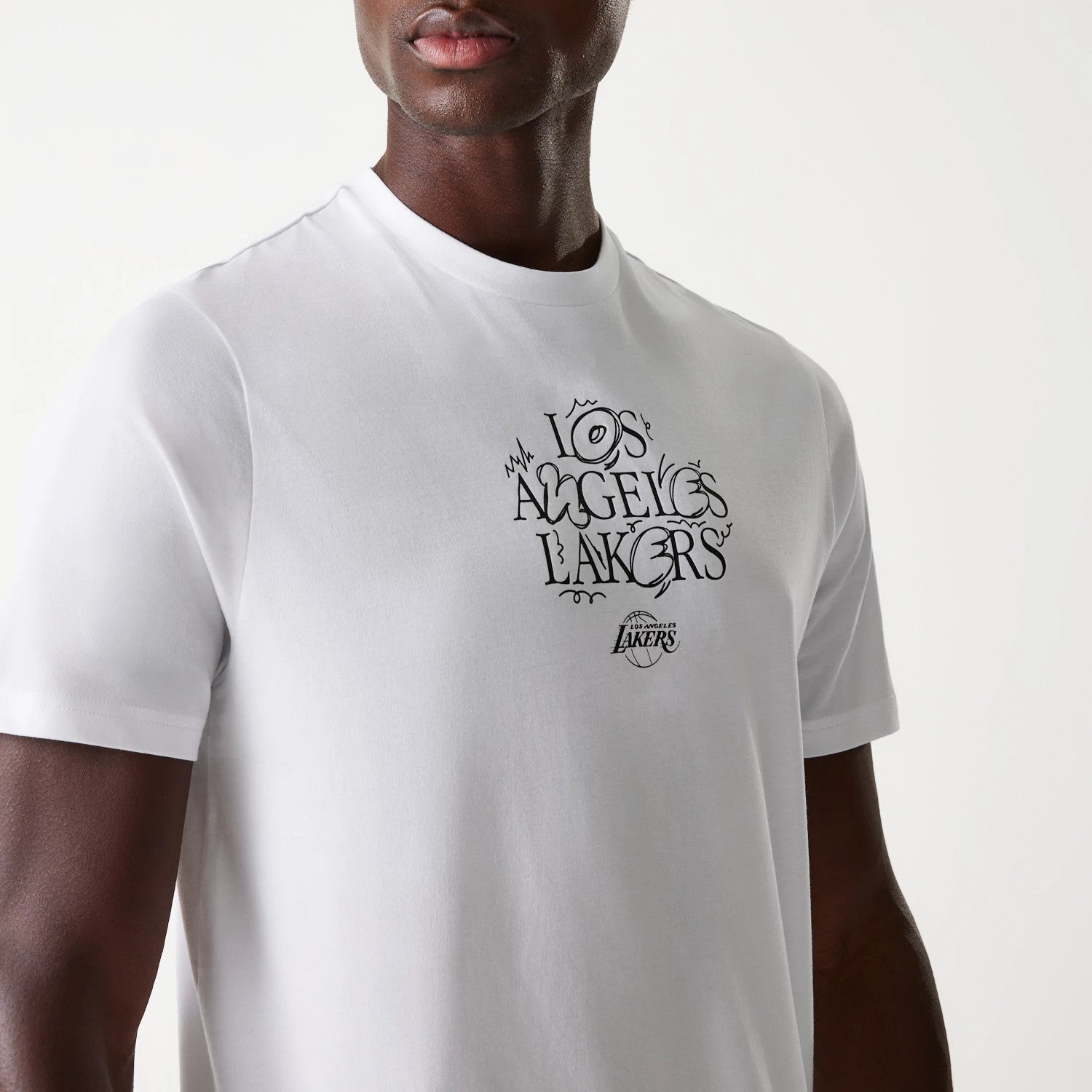 The Male model is wearing LA Lakers NBA Court Graphic White T-Shirt 3