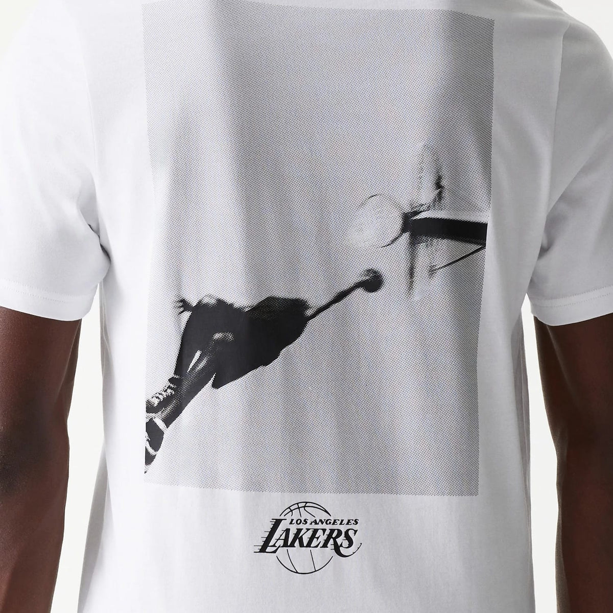 New Era LA Lakers NBA Court Graphic White T-Shirt, rear view showing a large black and white graphic of a basketball hoop and player, with a debossed Los Angeles Lakers logo centred at the bottom of the print on the white fabric.