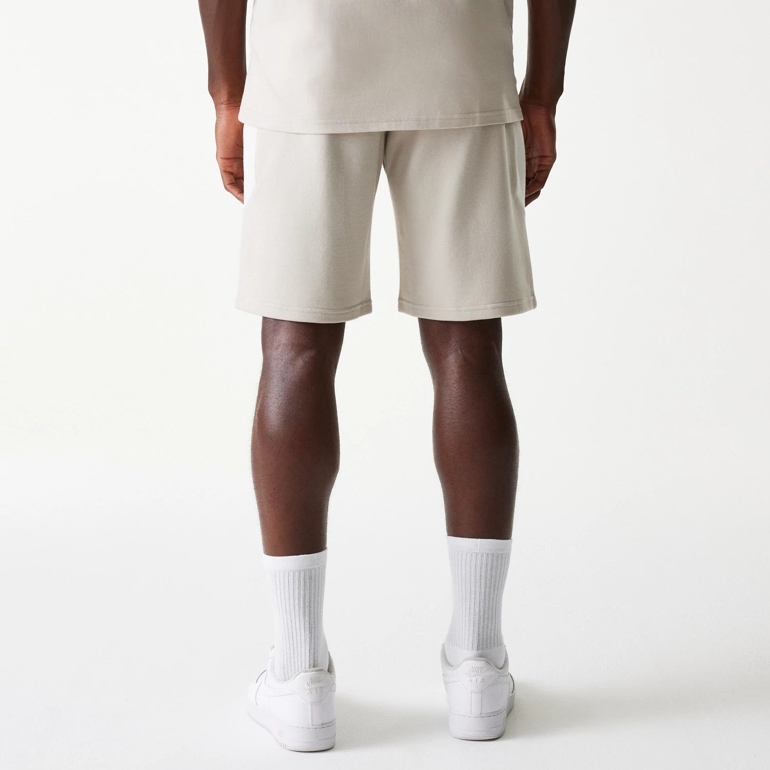 The Male model is wearing New York Yankees MLB Raglan Cream Shorts 2