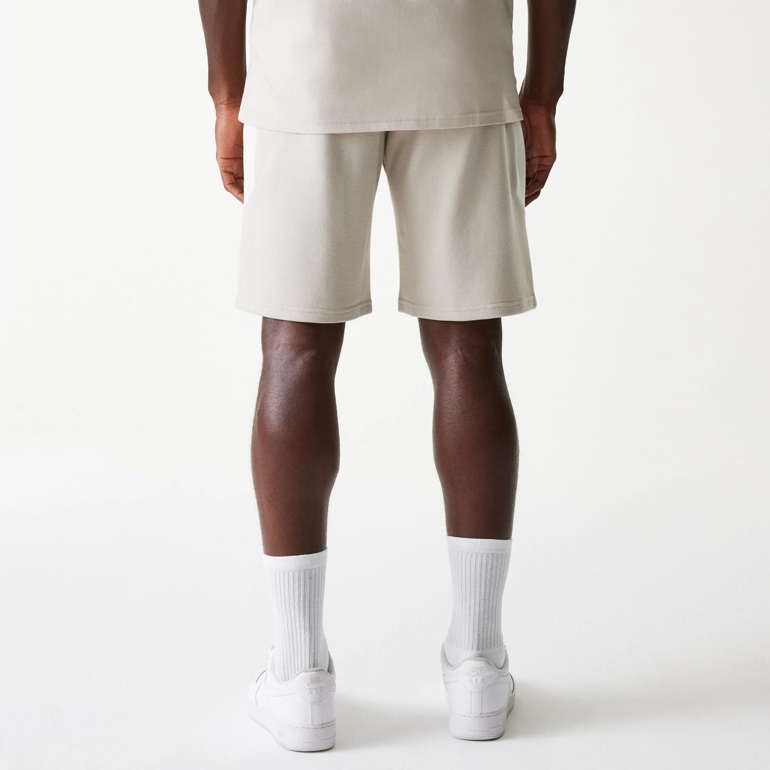 The Male model is wearing New York Yankees MLB Raglan Cream Shorts 2