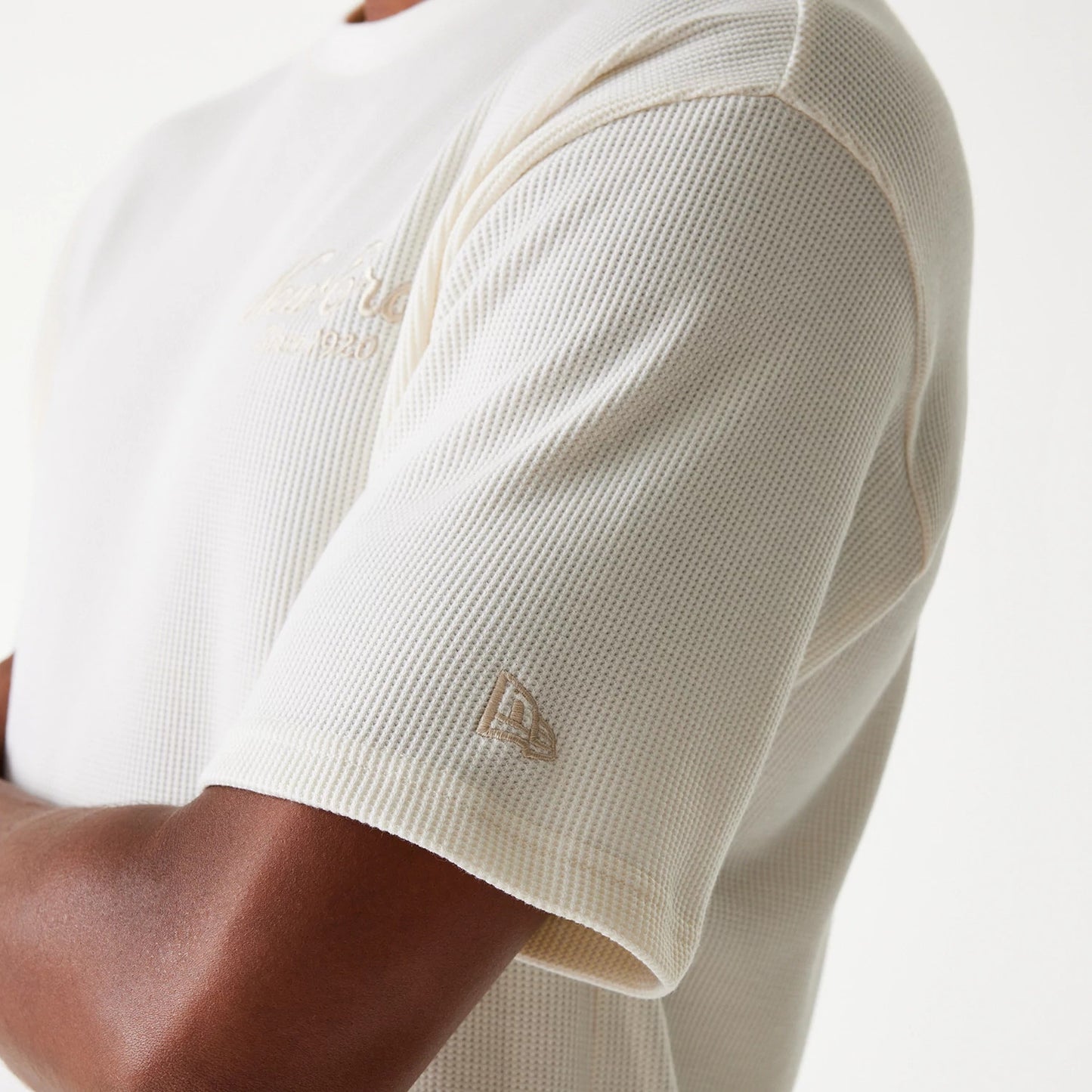 The Male model is wearing New Era Waffle Open White Oversized T-Shirt 8